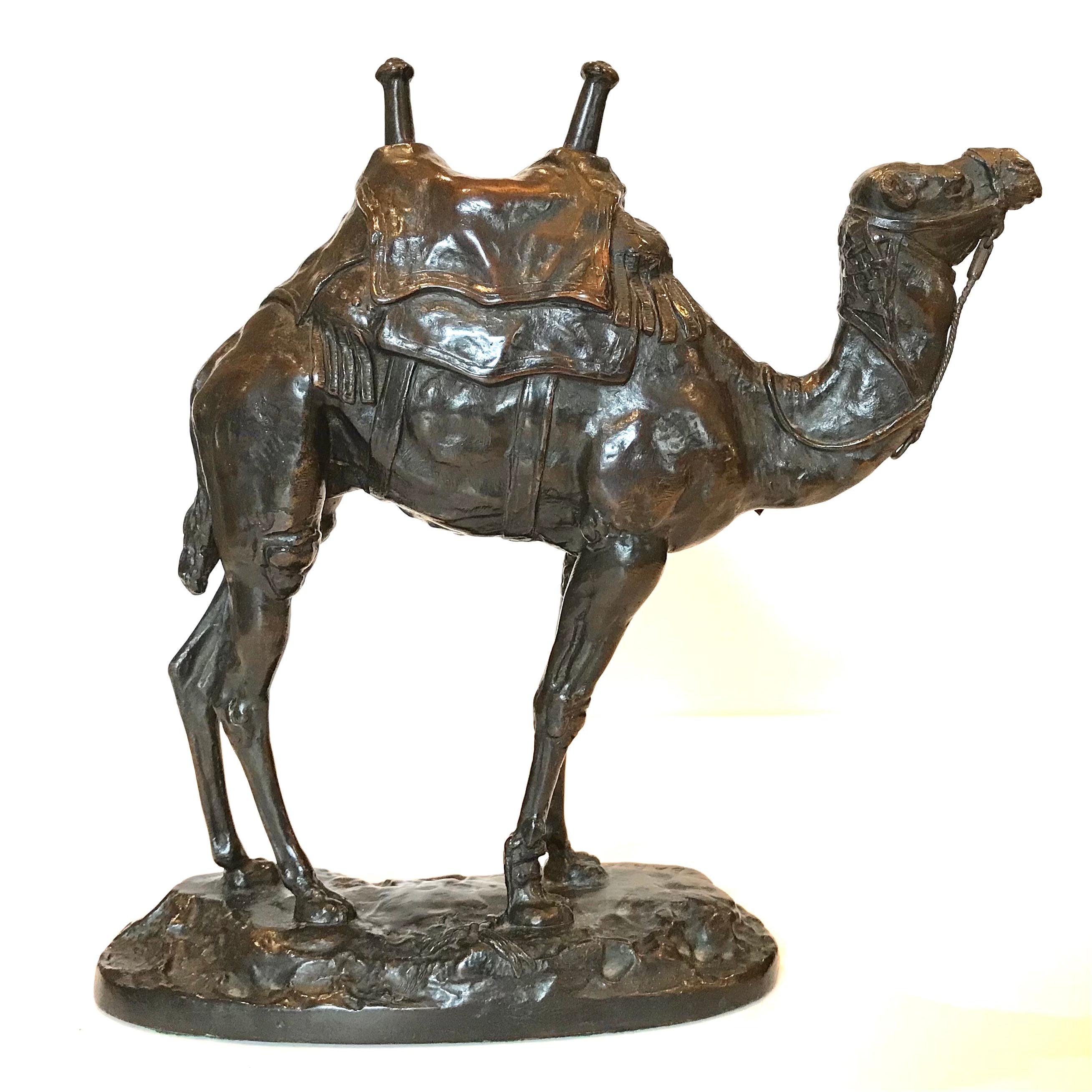 ANTOINE-LOUIS BARYE (FRENCH, 1796-1875): A patinated bronze model of Dromadaire harnaché d'Égypte

Signed 'BARYE' and stamped 'BARYE' by the Brame foundry
Raised on naturalistic base,  

Height: 10 Inches (25cm high)
Length: 10