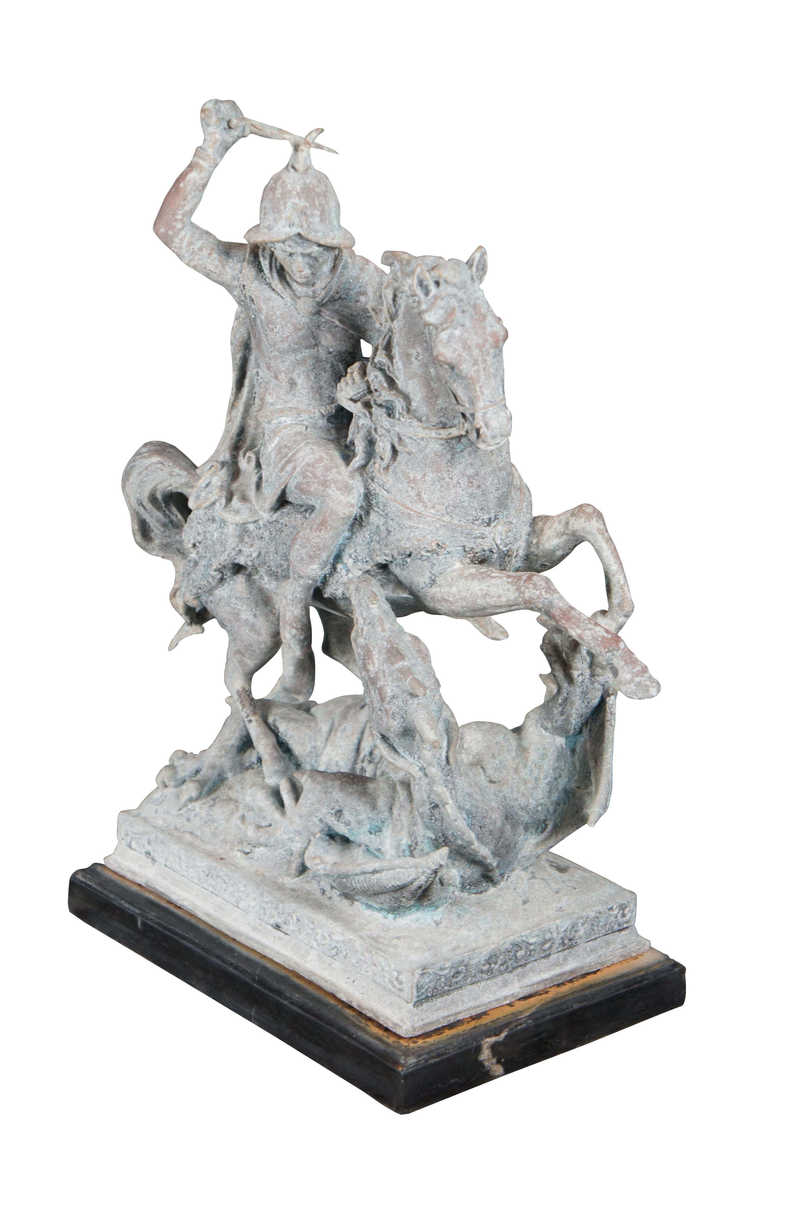 An eye caching figural sculpture of Saint George and the Dragon, After Antoine Louis Barye. As the legend goes, Saint George—a soldier venerated in Christianity—defeats a dragon. The story goes that the dragon originally extorted tribute from