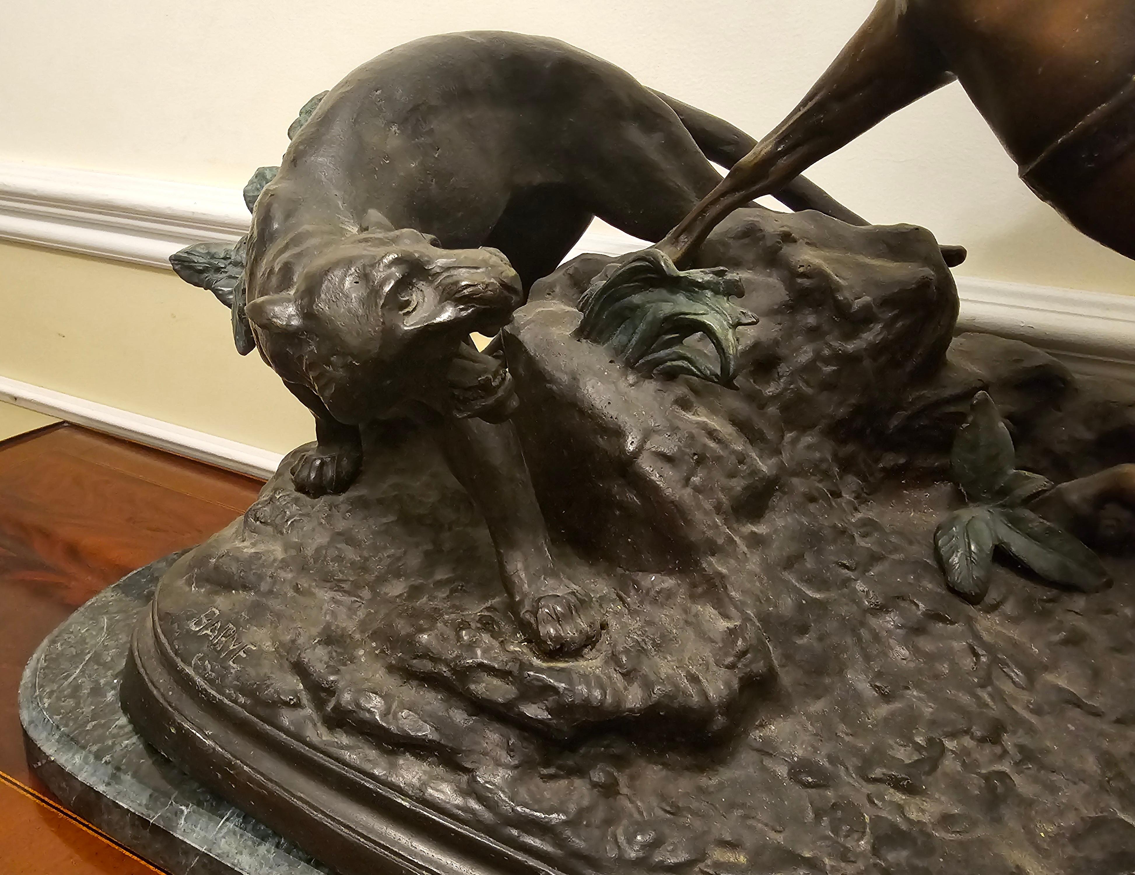 After Antoine-Louis Barye (French 1796 - 1875), Cougar Attack, Recast Bronze Figural Group On Marble Plinth.
Ever seen a piece of art that instantly transports you to another time and place? Antoine Barye's 