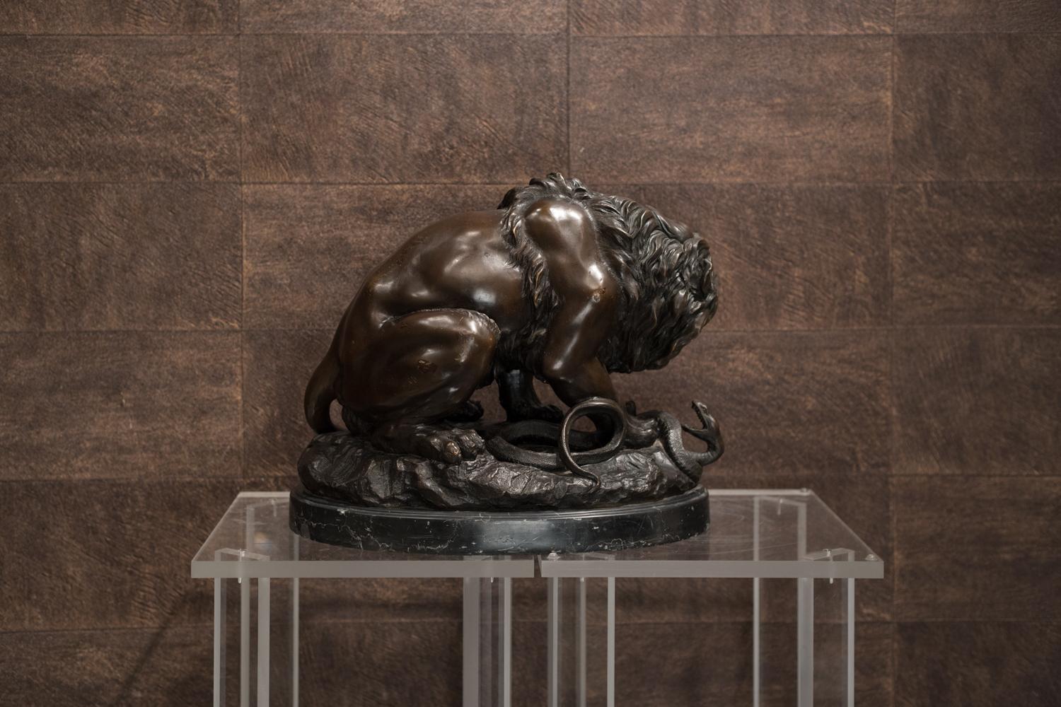 Antoine-Louis Barye (Paris 1795-1875).
Lion crushing a Snake.
Bronze, brown patina signed Barye on the left hand side of the base.
Black marble base.
The best of Barye’s sculptures surpass mere anatomical description and resonate with human