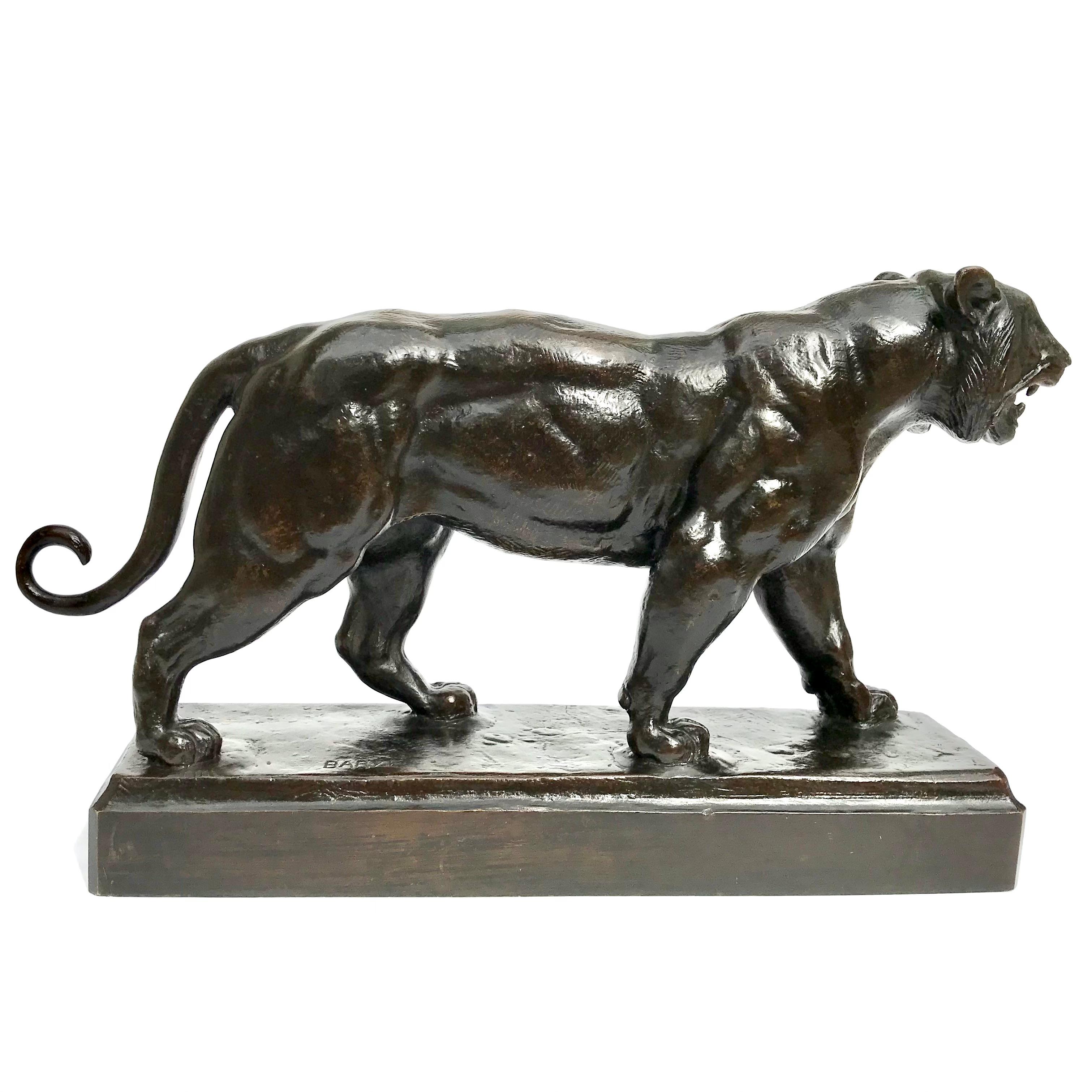 Antoine-Louis Barye (French 1799 - 1875) 
tigre marchant (walking tiger)
signed: BARYE Circa 1876
bronze, dark brown patina
Dimensions: 17 Inches long x 9.75 Inches high x 4 Inches deep.

This older bronze cast by Brame right after Barye’s death is