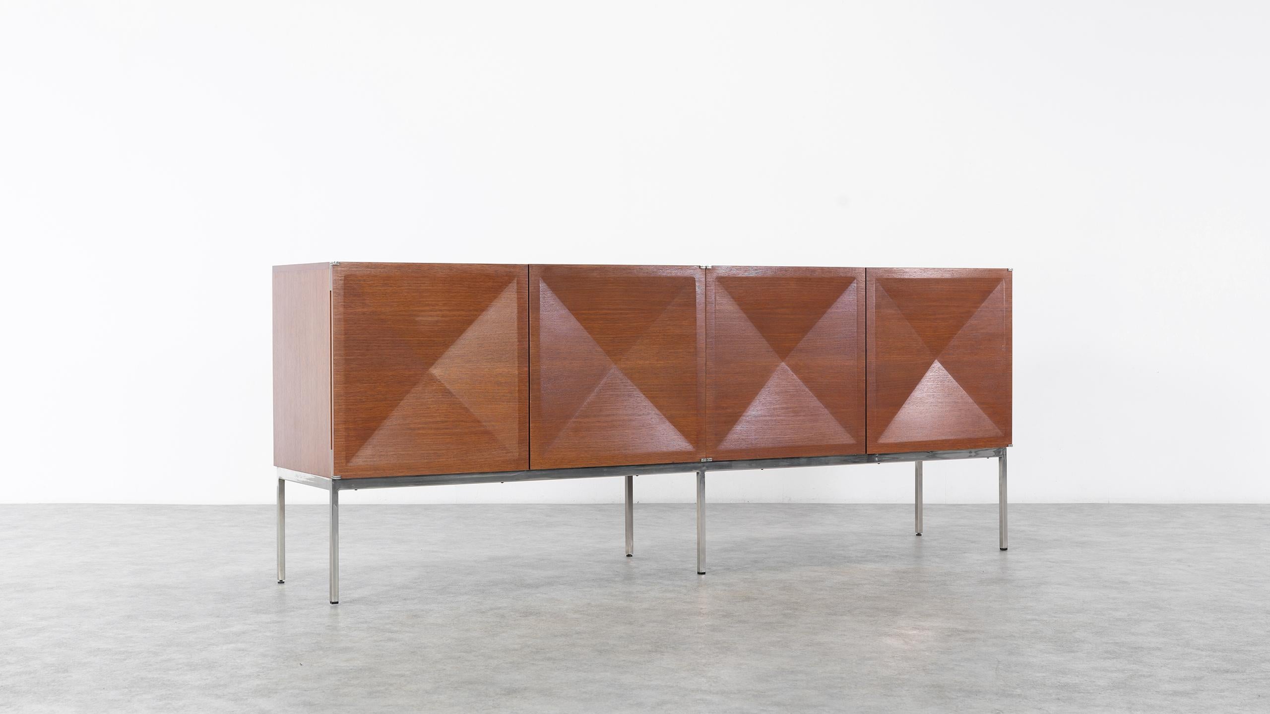 Sideboard with diamond shaped doors (Pointe de Diamant) designed by Antoine Philippon and Jacqueline Lecoq. 
Manufactured by Behr, Germany in 1962.

(Original EWB, Behr stamp on the backside, see photos)

Sideboard with four diamond shaped doors