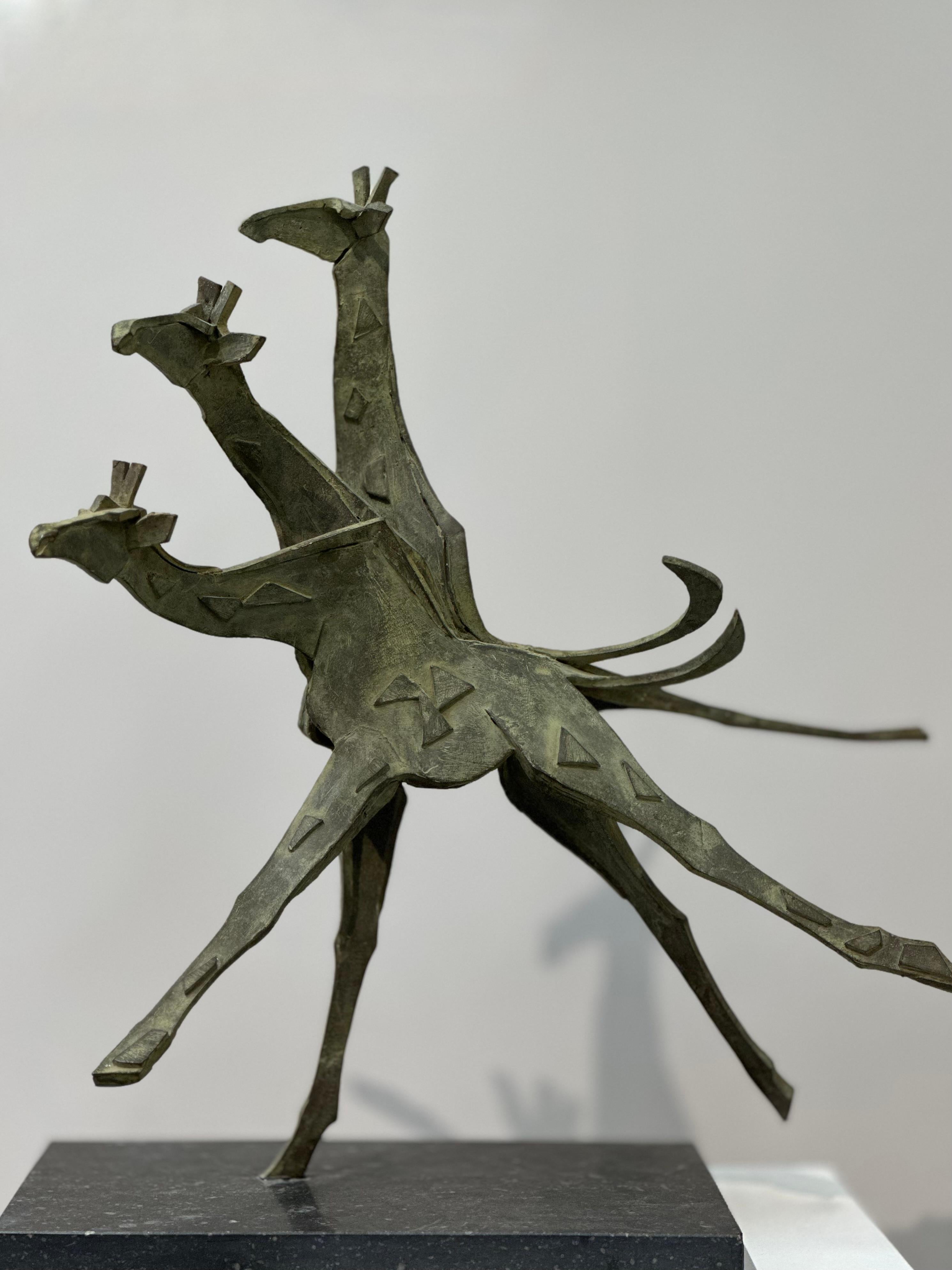 Antoinette Briët
'Giraffes''
50 x 60 x 50 cm
Bronze
Unica ( there is only one of it, no series)

This sculpture is made by Dutch artist Antoinette Briet. Her forms always are an abstraction of movement or stillness in the world of animals. In this