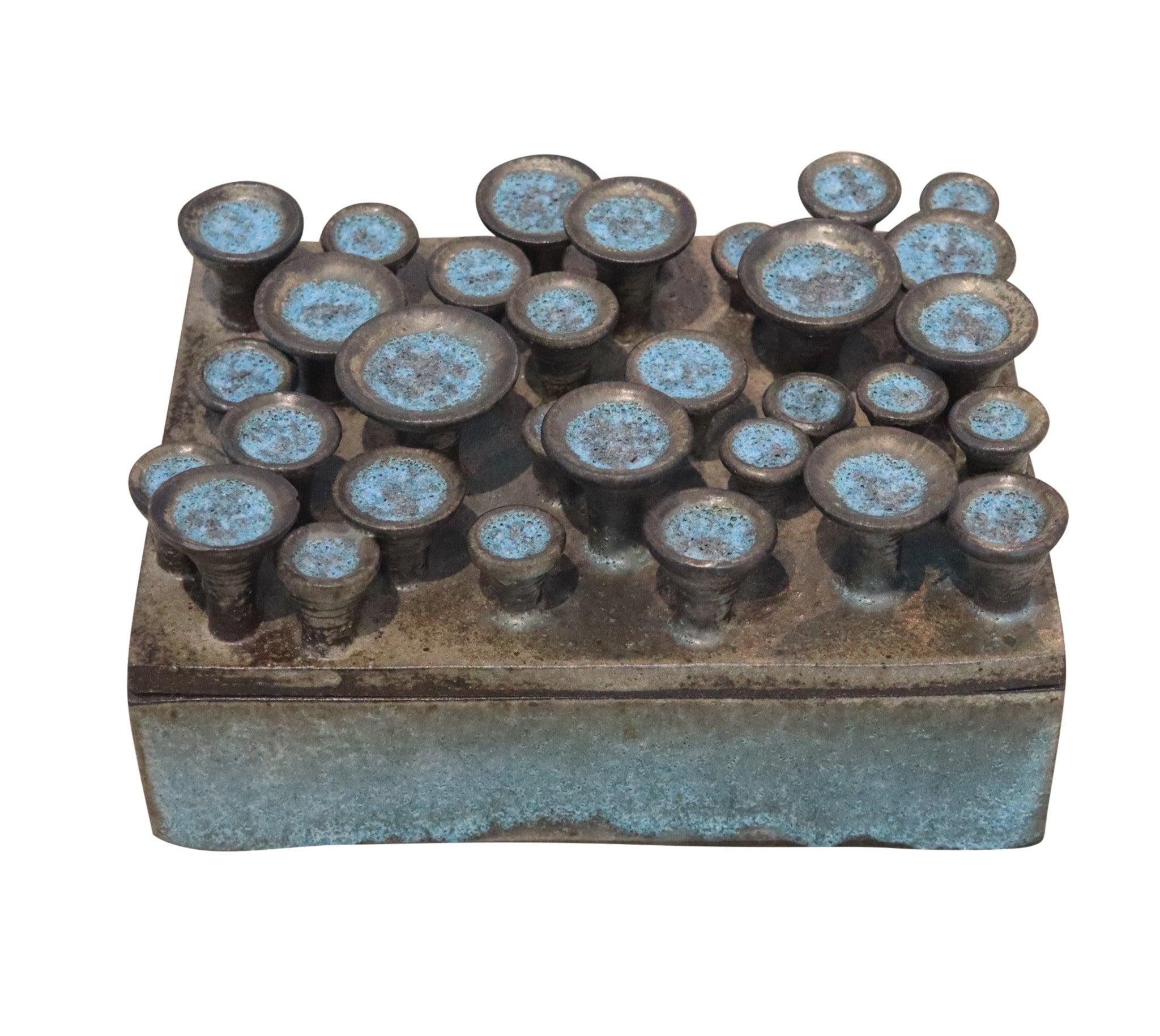 Decorative pottery box designed by Antoinette Faragalla.

This is a great decorative pottery lidded box created by the artist Antoinette Faragallah. The large rectangular turquoise potterDecorative pottery box designed by Antoinette Faragalla.

This