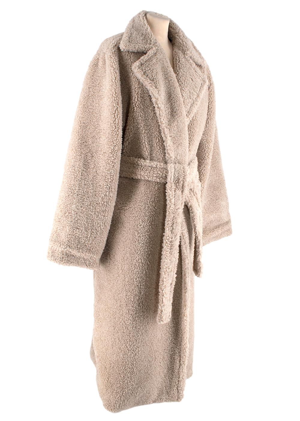 Anton Belinskiy Faux-Shearling Robe-Coat 

-Beige faux-shearling robe-coat from Anton Belinskiy featuring a notched collar, long sleeves, a belted waist and patch pockets on the right.

Measurements:

56cm shoulder to shoulder 
60cm chest 
63cm