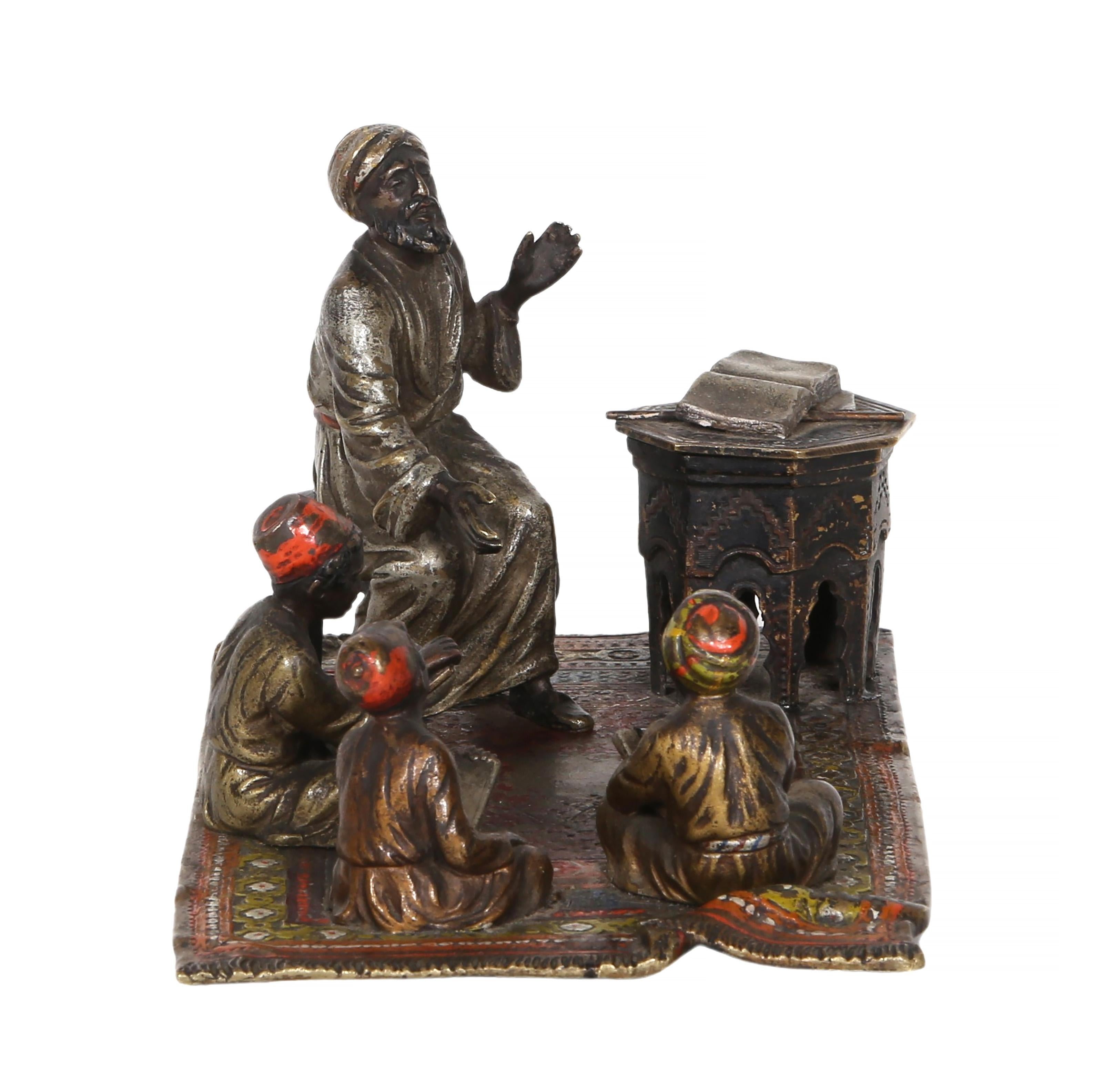 Insegnante di Corano con alunni, scultura orientalista in bronzo di Anton Chotka - Figurative Sculpture Oro di Anton Chotka 
