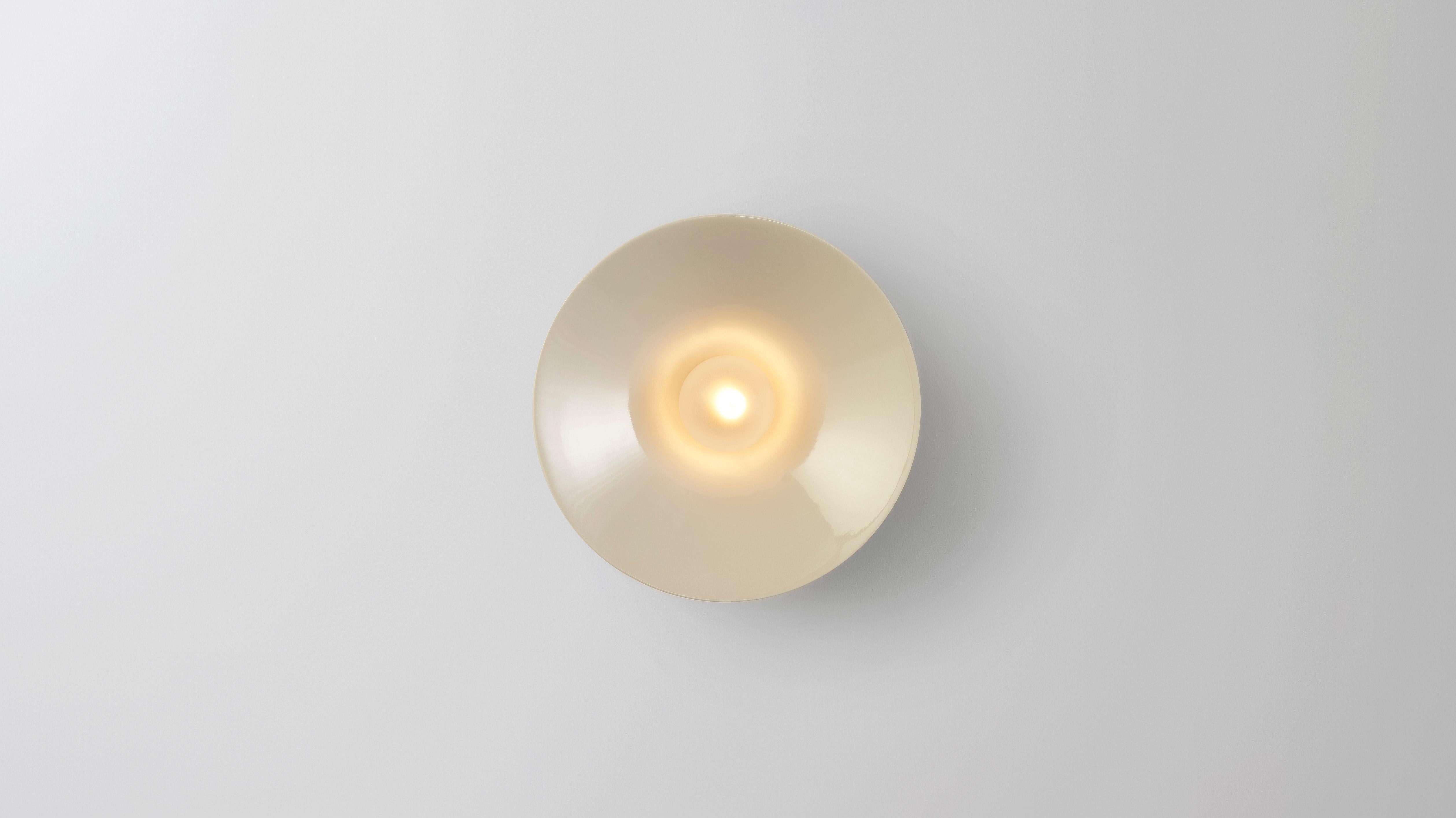 Anton in ceramic by Volker Haug
Anton series
Dimensions: W 18, H 18, D 10.3 cm
Materials: Cast ceramic
Glaze: Clear
Lamp: G9 LED (240V / 120V US). 12V option available
Glass bulb: 4.5 cm Ø, Frosted
Weight: 1.5kg

Form follows force. The Anton series