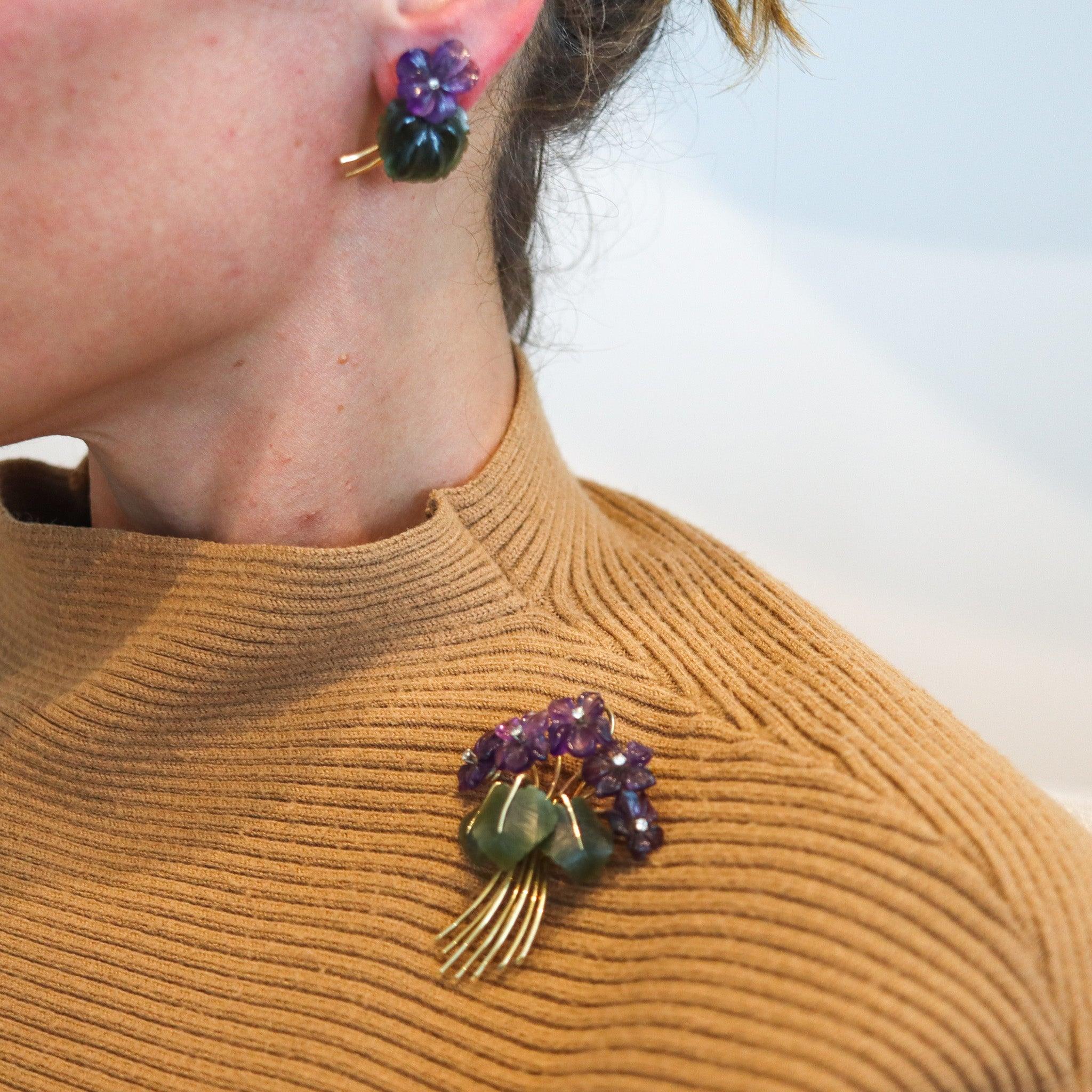 Brooch and earrings parure designed by Anton Janda.

This is a magnificent set composed by a brooch and a pair of earrings, created in Vienna Austria back in the 1950 by the master goldsmith Anton Janda. This set was carefully crafted in the desired