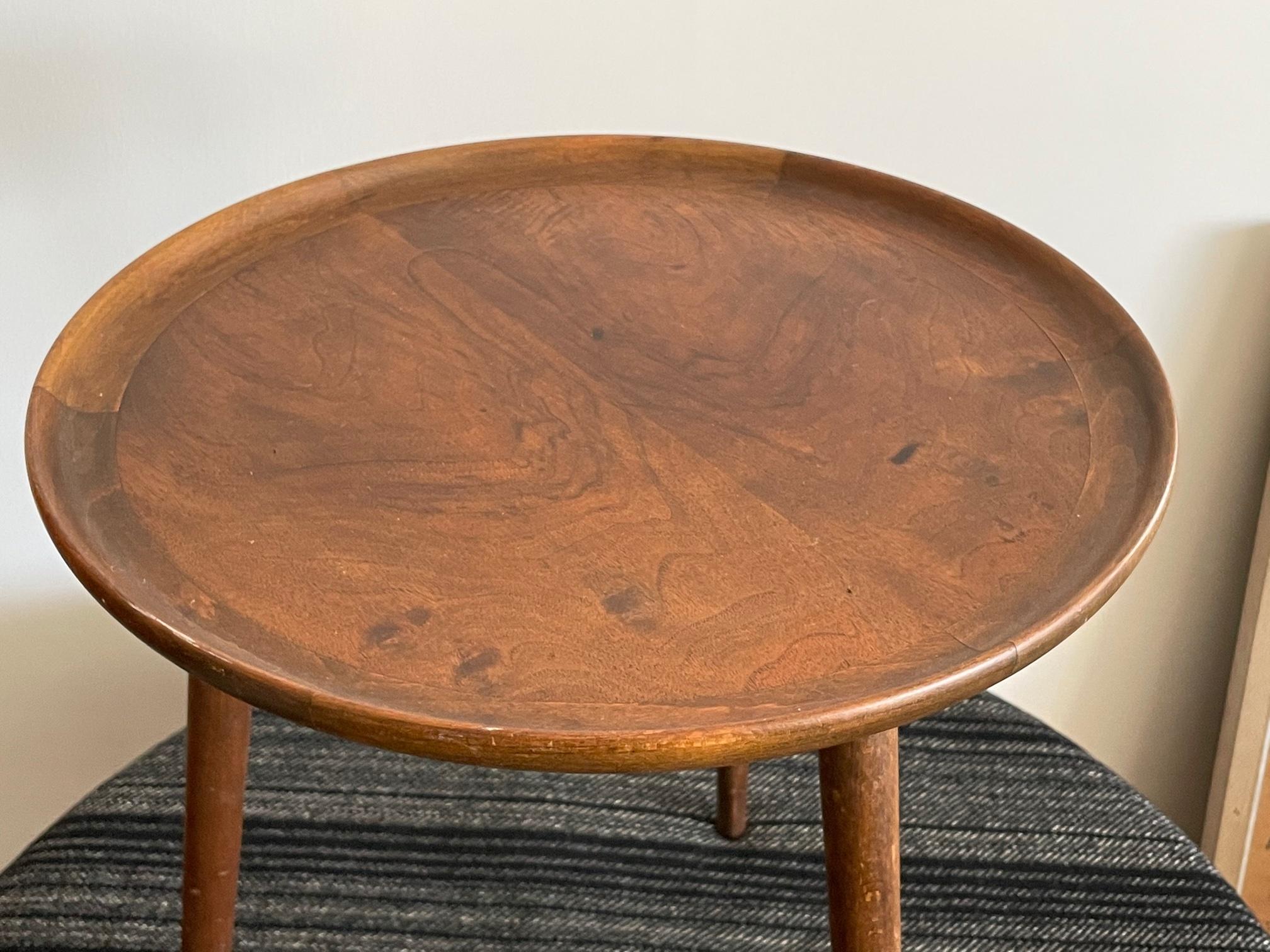 An unusual side table designed by Anton Kildeberg with a pie edge shaped top. Danish, ca' 1950's.