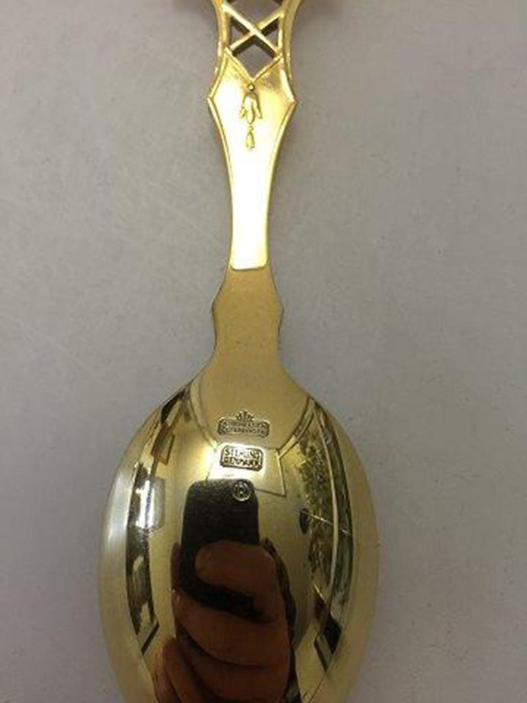 Anton Michelsen commemorative spoon in gilded sterling silver from 1940.

For the occation of Christian X 70th Year, 26 Sep 1940.
Designed by: Jens Ingwersen.
 