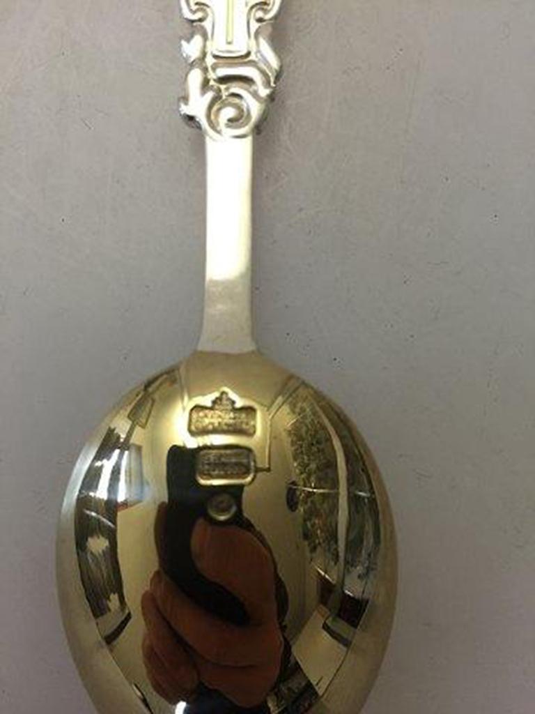 Anton Michelsen commemorative spoon in gilded sterling silver from 1899

For the occation of Four Kings (Christian IX, Frederik VIII, Christian X and Frederik IX), 1899.
Designed by: Thorvald Bindesbøll
Done in gilded Sterling silver. In perfect