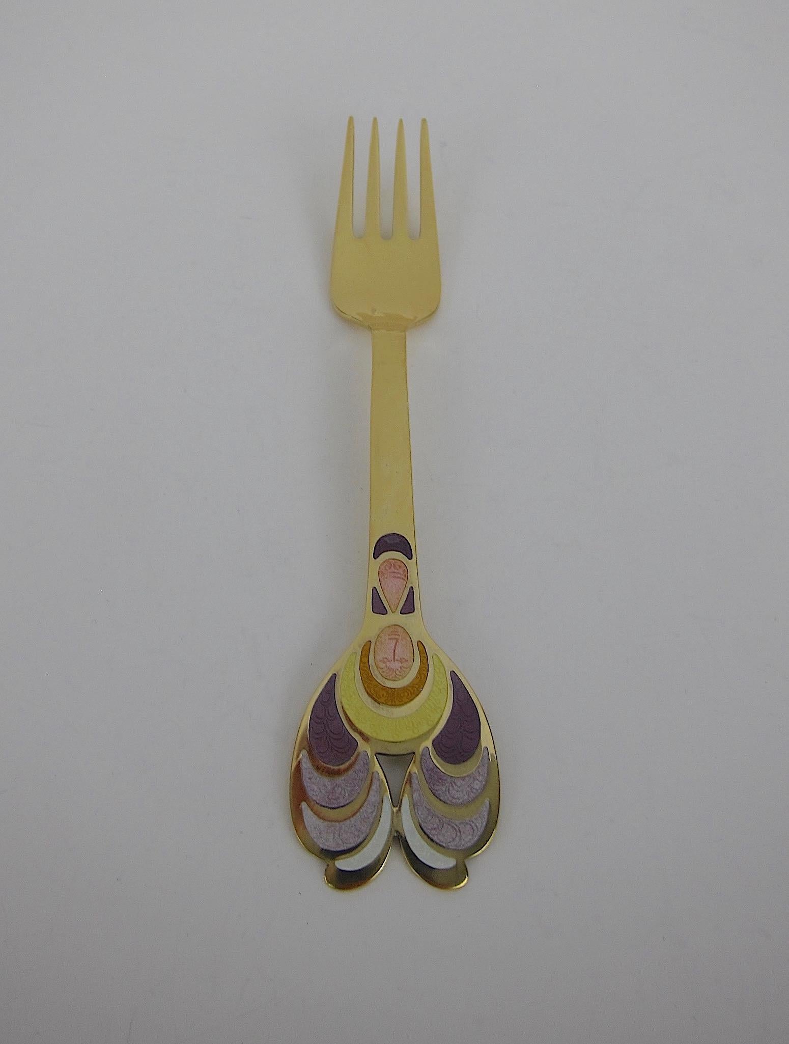 A Danish gilded sterling silver and enamel Christmas fork from Anton Michelsen of Copenhagen, Denmark. Bjorn Wiinblad created this 