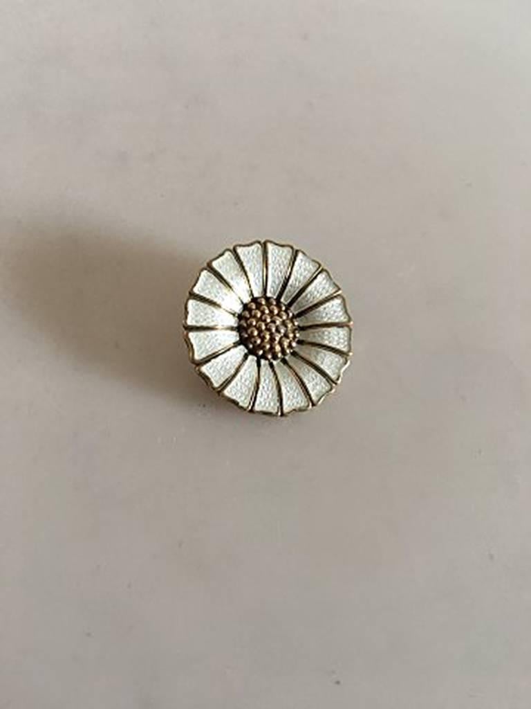 Anton Michelsen Gilded Sterling Silver and Enamel Daisy Brooch. Measures 2.5 cm / 0 63/64 in. Weighs 5.1 g / 0.18 oz.