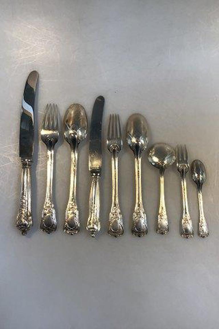 Anton Michelsen Rosenborg flatware set in sterling silver for 8 people. 72 Pieces. 

The set consists of the following:

8 x Dinner Knives 23 cm L (9 1/16