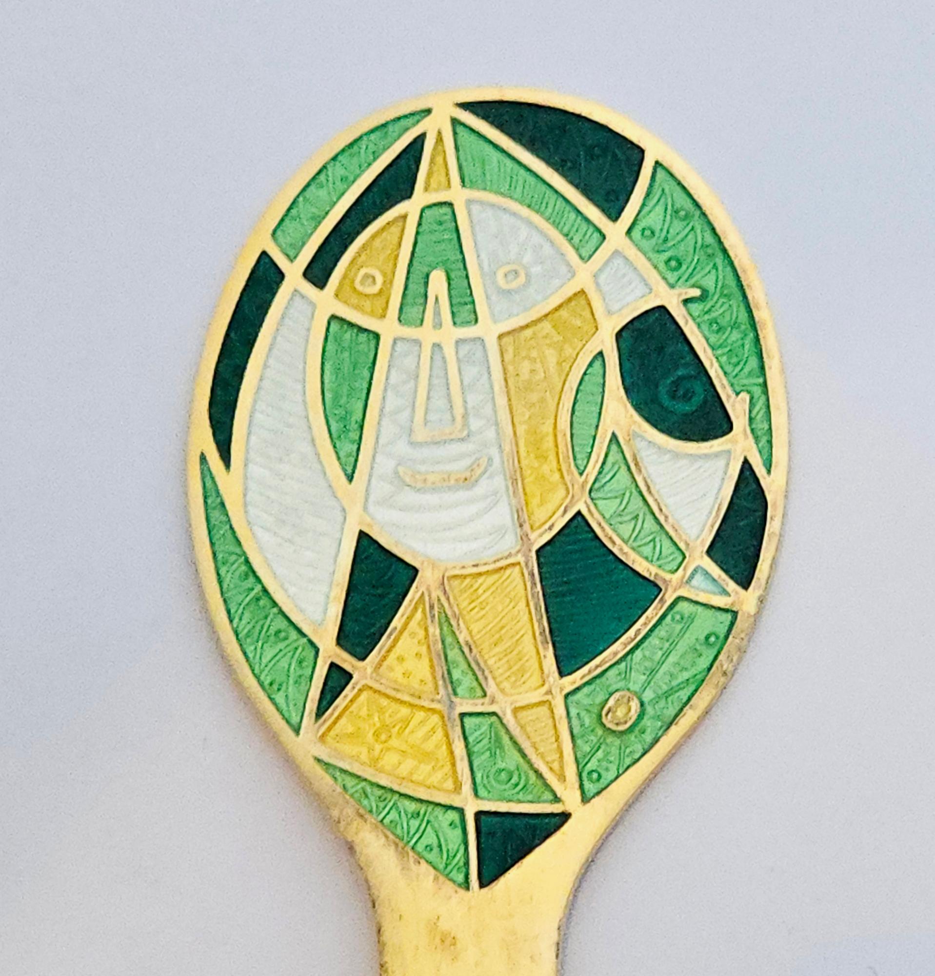 Anton Michelsen Gilded Sterling Silver Gilt Christmas Spoon,
Egill Jacobsen is the Designer,
1980

The 1980 Anton Michelsen Christmas Spoon is gilded sterling silver with an enamel handle. It was designed by Egill Jacobsen.  Egill Jacobsen painted