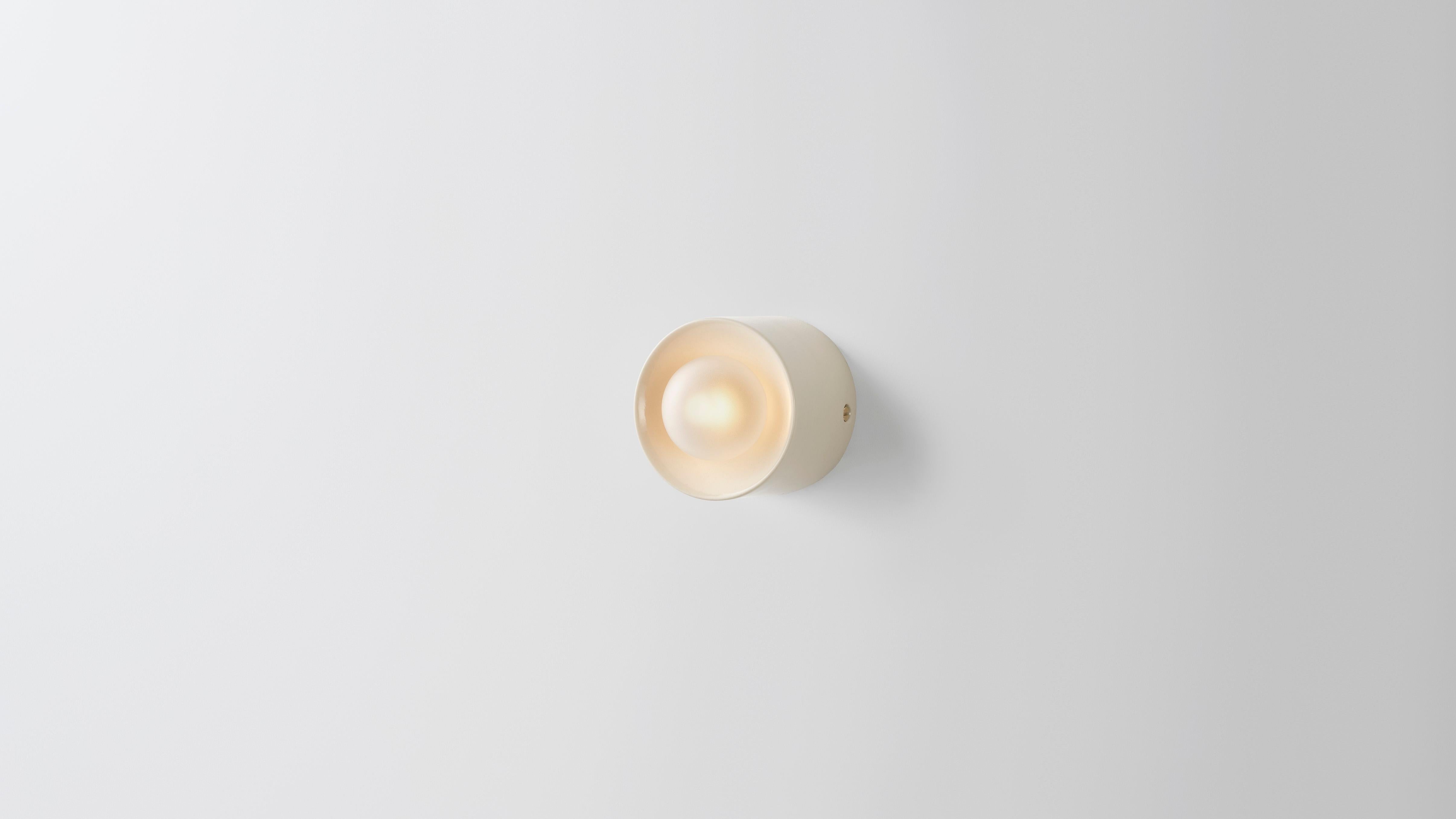 Anton Micro in ceramic by Volker Haug
Anton series
Dimensions: W 8, H 8, D 6.3 cm
Materials: Cast ceramic
Glaze: Clear
Lamp: G9 LED (240V / 120V US). 12V option available
Glass bulb: 4.5 cm ø, frosted
Weight: 1kg

Anton Micro is the smallest in the