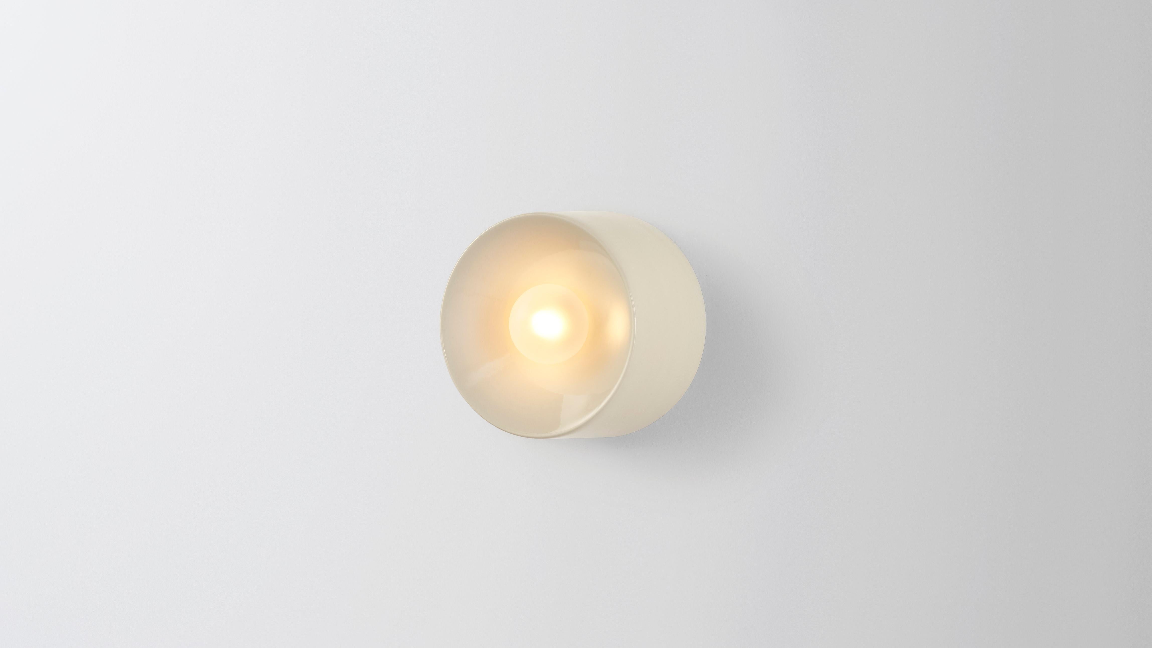 Anton mini in ceramic by Volker Haug 
Anton series
Dimensions: W 13 H 13 D 8.3 cm
Materials: Cast Ceramic
Glaze: Clear
Lamp: G9 LED (240V / 120V US). 12V option available
Glass bulb : 4.5 cm ø, Frosted
Weight: 1kg

Anton Mini (Ø13 cm) is