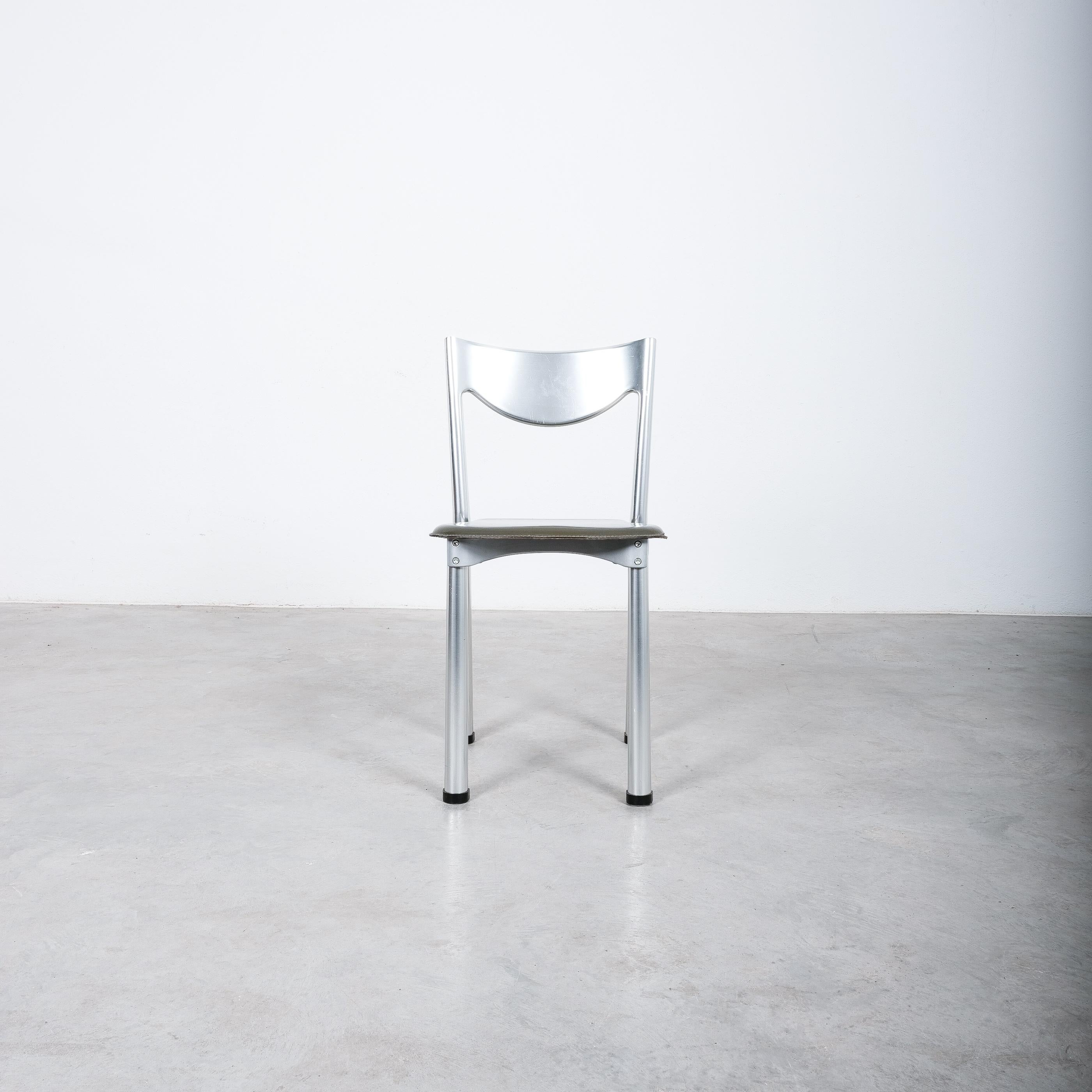 Rare set of 4 chairs by Antonello Mosca for Ycami Collection, circa 1980.

Sold as individual pieces.

Rare chairs made of aluminum and leather by Antonello Mosca. Postmodern chairs with cold-pressed shaped aluminum load-bearing structure.