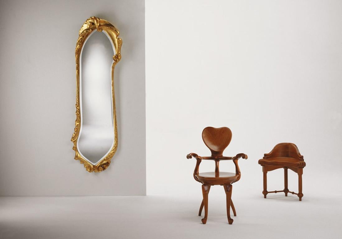 Mirror designed by Antoni Gaudi, circa 1902 and manufactured by BD furniture in Barcelona.

Solid oak: varnished or covered in fine gold leaf.

58cm x 195cm

Year: 1902

Antoni Gaudí (1852/1926) is, without doubt, the most internationally
