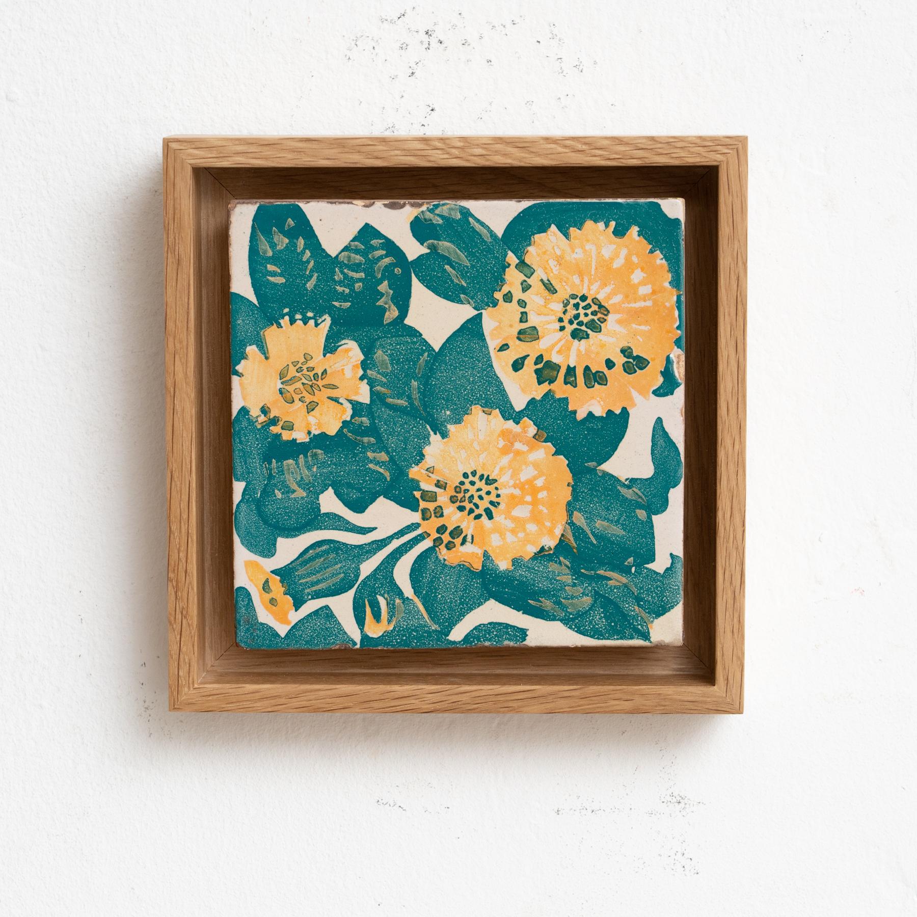 Decorative ceramic tile by Antoni Gaudi, inspired by the marigold and dianthus motifs on the decorative ceramic tiles he designed for the facade of Casa Vicens, which constitute some of its most iconic features.

In good original condition, with
