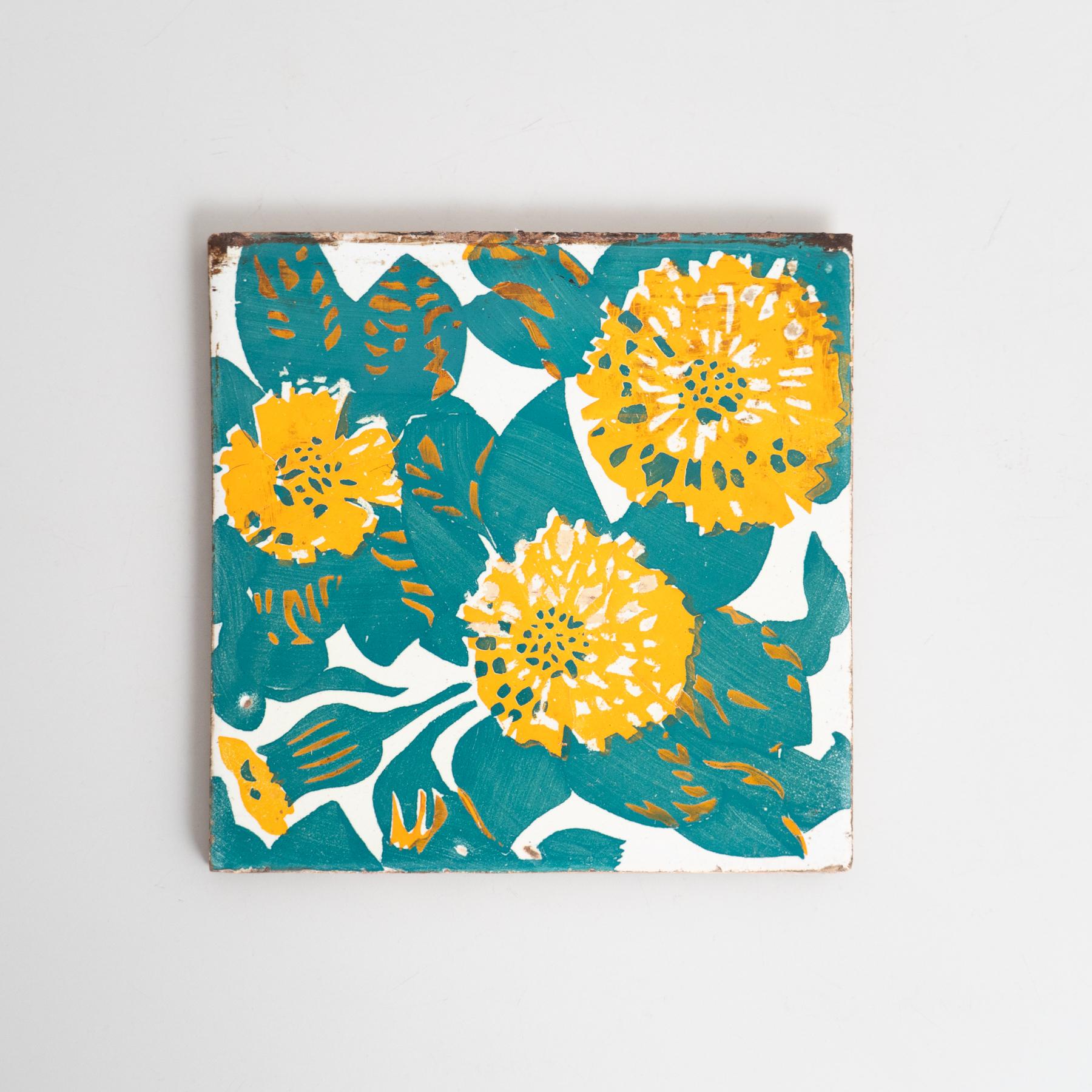 Decorative ceramic tile by Antoni Gaudi, inspired by the marigold and dianthus motifs on the decorative ceramic tiles he designed for the facade of Casa Vicens, which constitute some of its most iconic features.

In good original condition, with