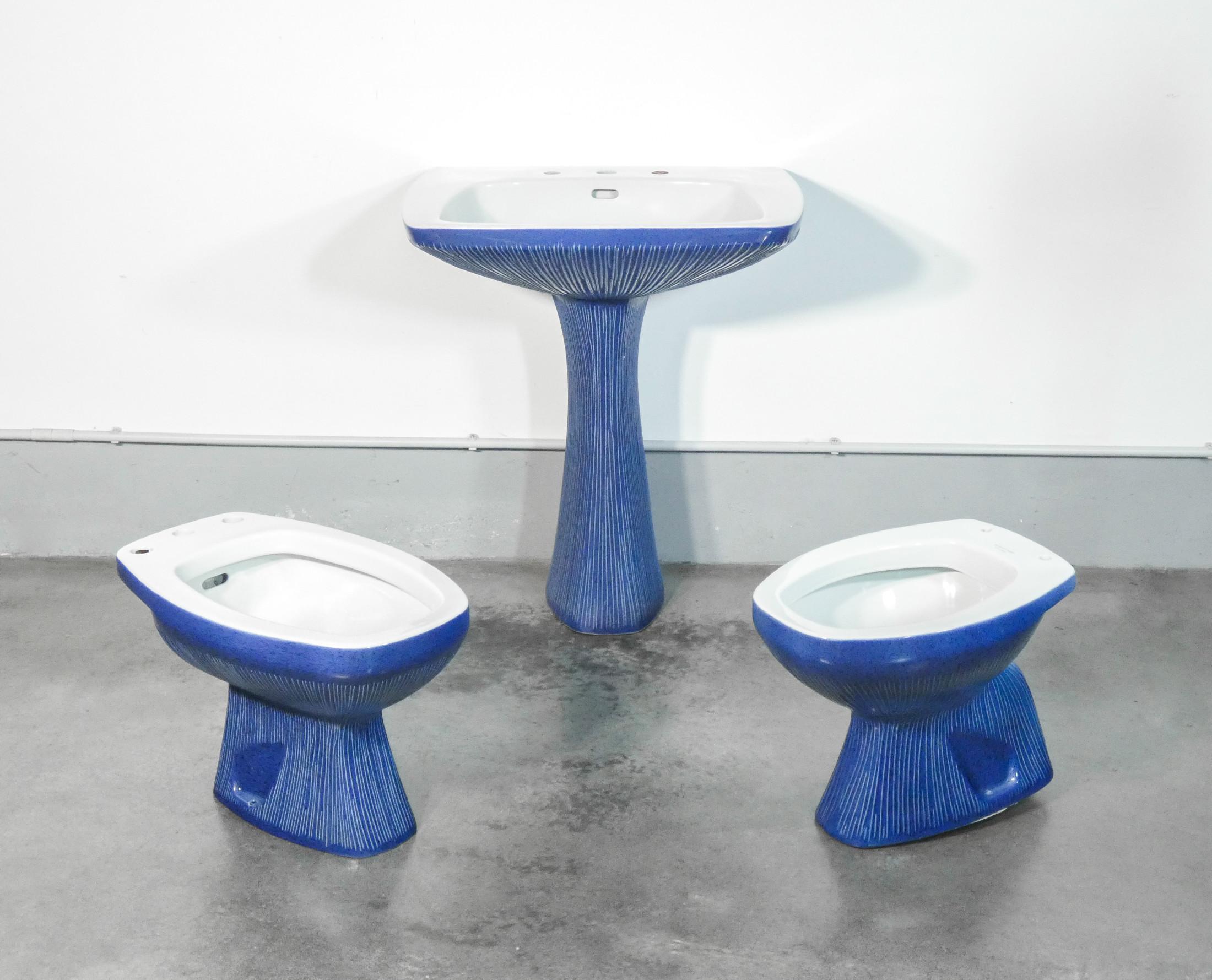 Antonia CAMPI design.
GARDENA model bathroom set.
Washbasin,
toilet and bidet,
in lavenite.
S.C.I. Laveno

Origin
Italy

Period
1968

Designer
Antonia CAMPI
(1921 - 2019) was an Italian designer. She attended the Collegio delle