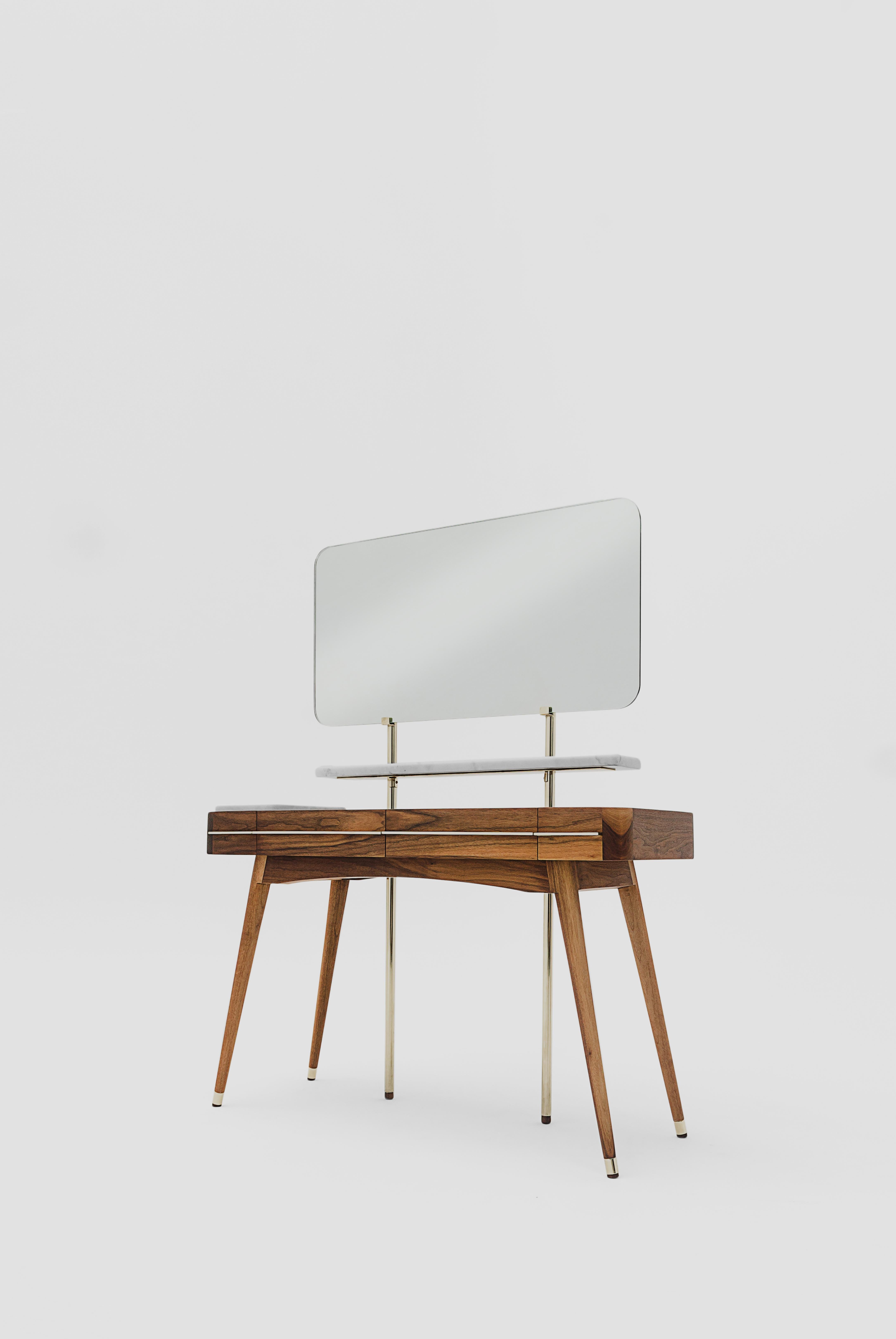 Antonia dresser by Lorena Vieyra
Dimensions: D 120 x W 47 x H 160 cm
Materials: walnut wood, Calcatta marble.

Dressing table made of walnut and steel. Includes mirror without distortion and Calacatta marble.

Architect from the Universidad