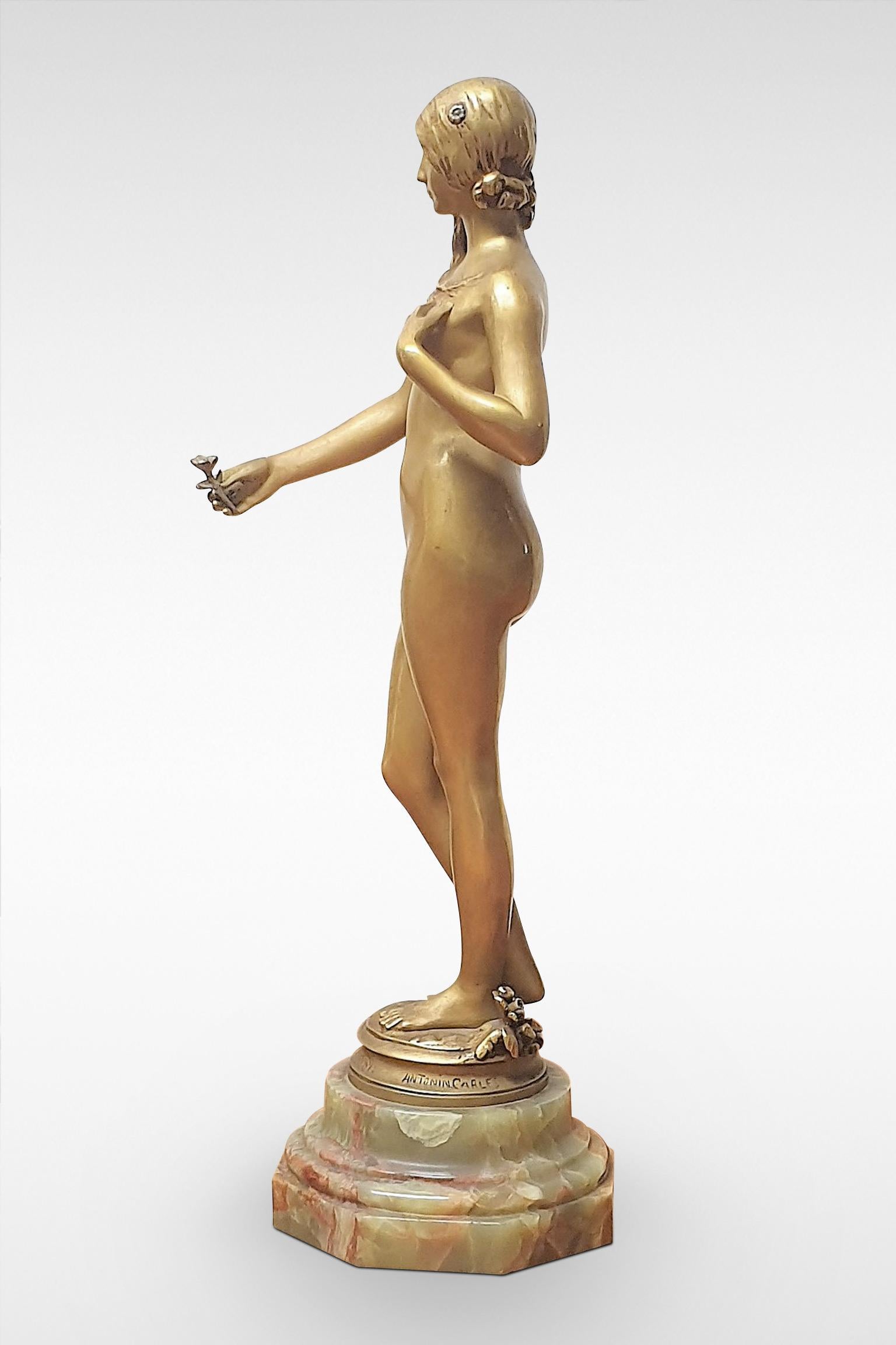 An original Art Nouveau gilt bronze sculpture ‘La Jeunesse’ of a nude young lady, by Antonin Carles. Signed with designer’s signature and foundry marks. Mounted on an onyx base, and in excellent condition, circa 1900.