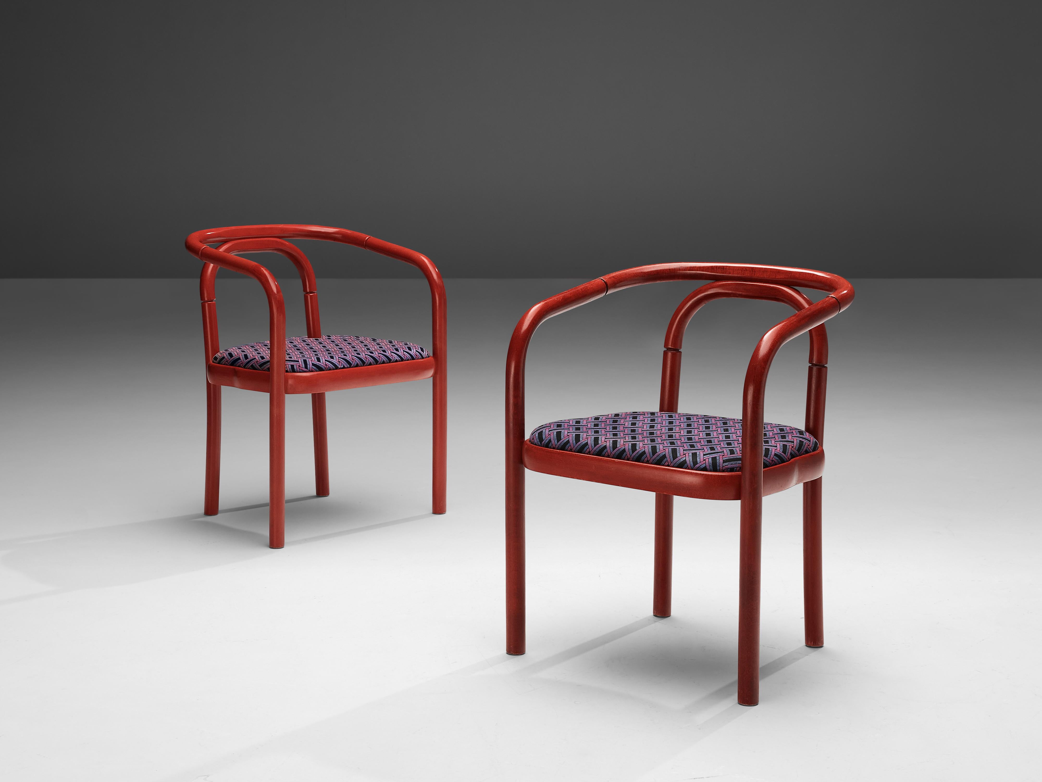 Antonin Suman for Ton, armchairs model E4309, lacquered beech, fabric, Czech Republic, 1977

These dining chairs are manufactured by Ton. The chair features a wonderful bentwood frame that is colored in an eye-catching red tone. Engraved rings add a