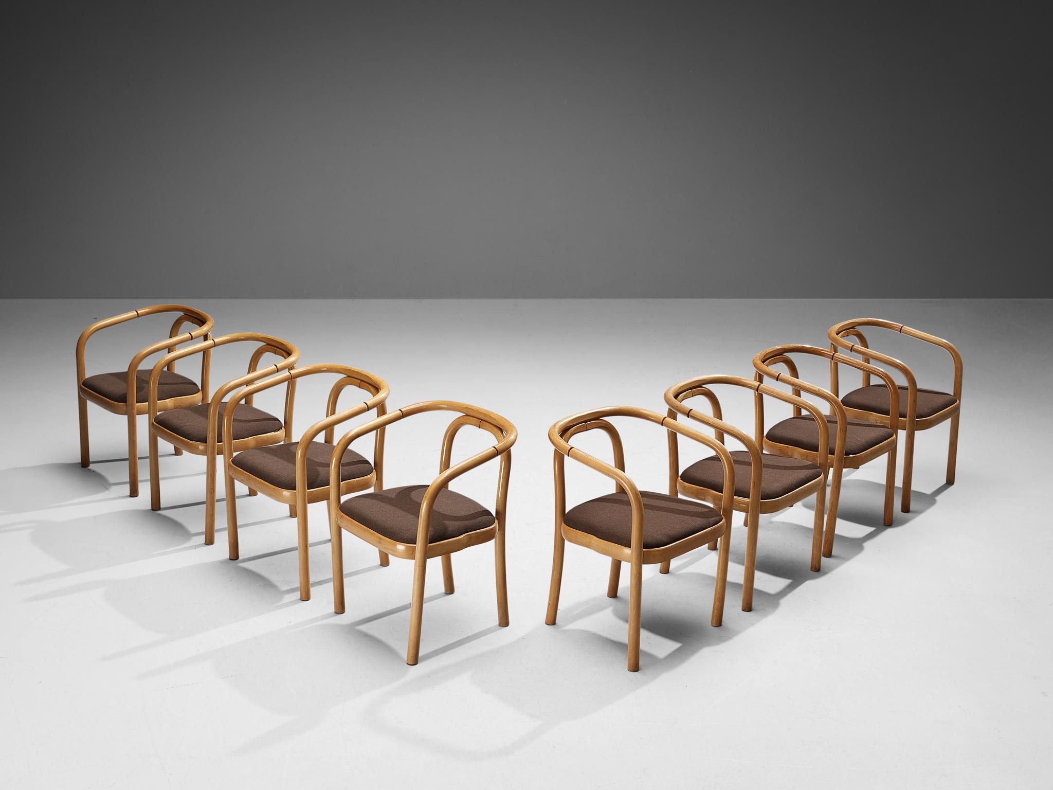 Antonin Suman for TON, set of eight armchairs, model E4309, beech, fabric, Czech Republic, 1970s
 
These dining chairs are manufactured by Ton and designed by Antonin Suman. They feature a wonderful bentwood frame that is engraved with rings that