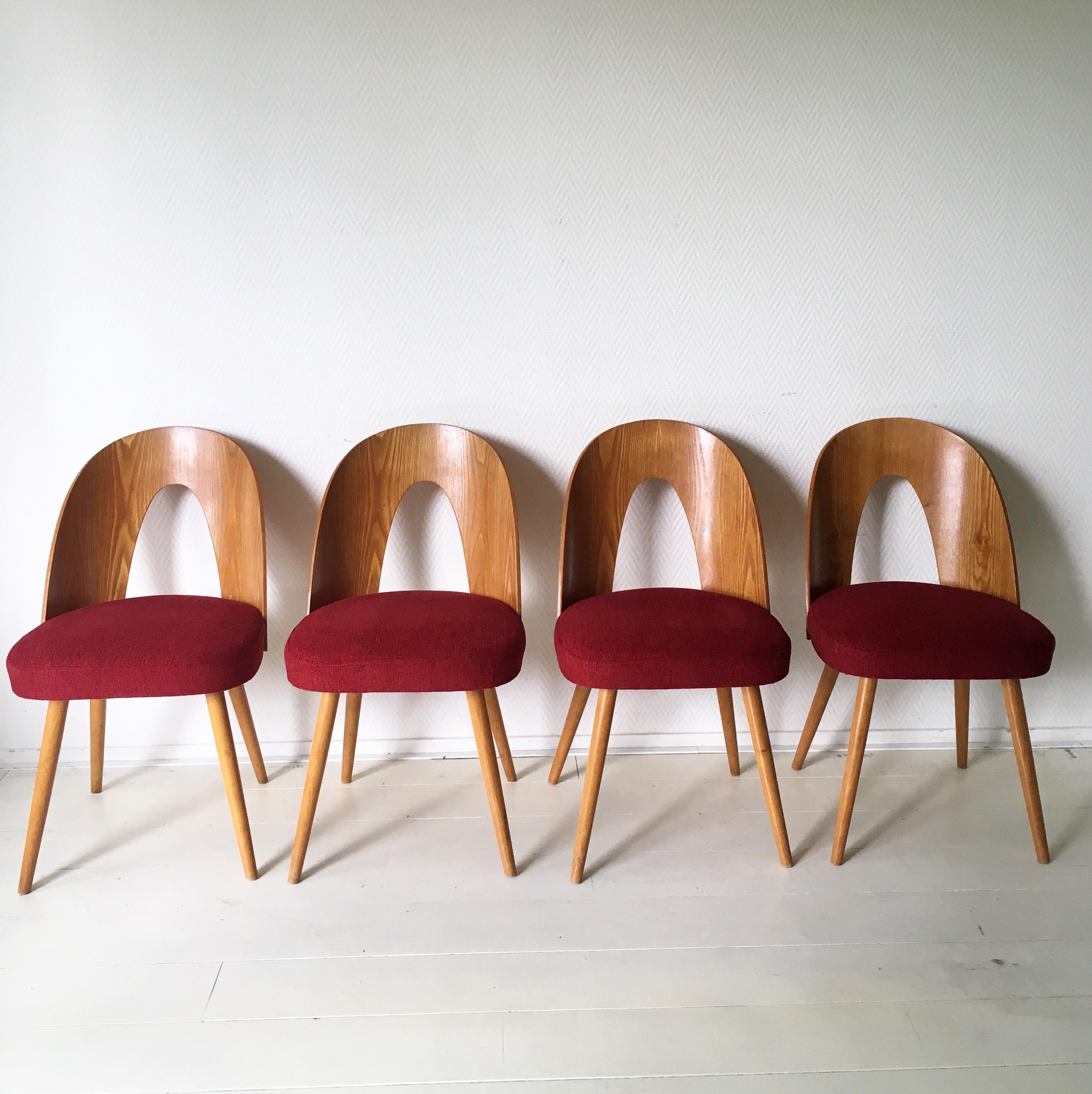 Stylish Czechoslvakian set of four wonderful Dining Room Chairs which were designed by Antonin Suman for Tatra Nabytok ca. the 1950’s. The chairs are as new while they have been re-upholstered with a classy Red Velvet like fabric. Only minimal signs