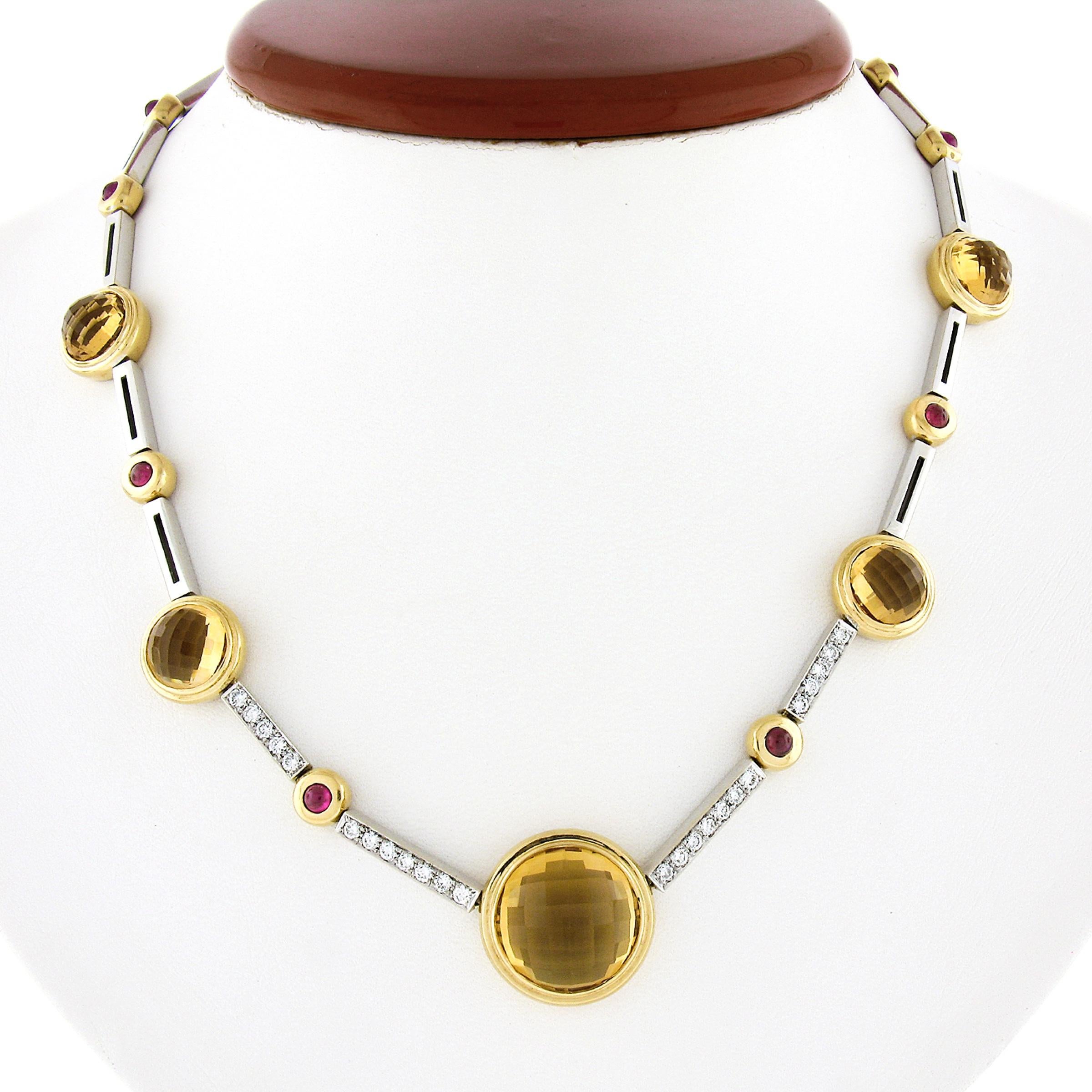 Here we have a gorgeous and very well made necklace that is crafted from solid 18k white and yellow gold and designed by Antonini. The necklace features fine citrine stones that are neatly bezel set throughout with the largest at its center, showing