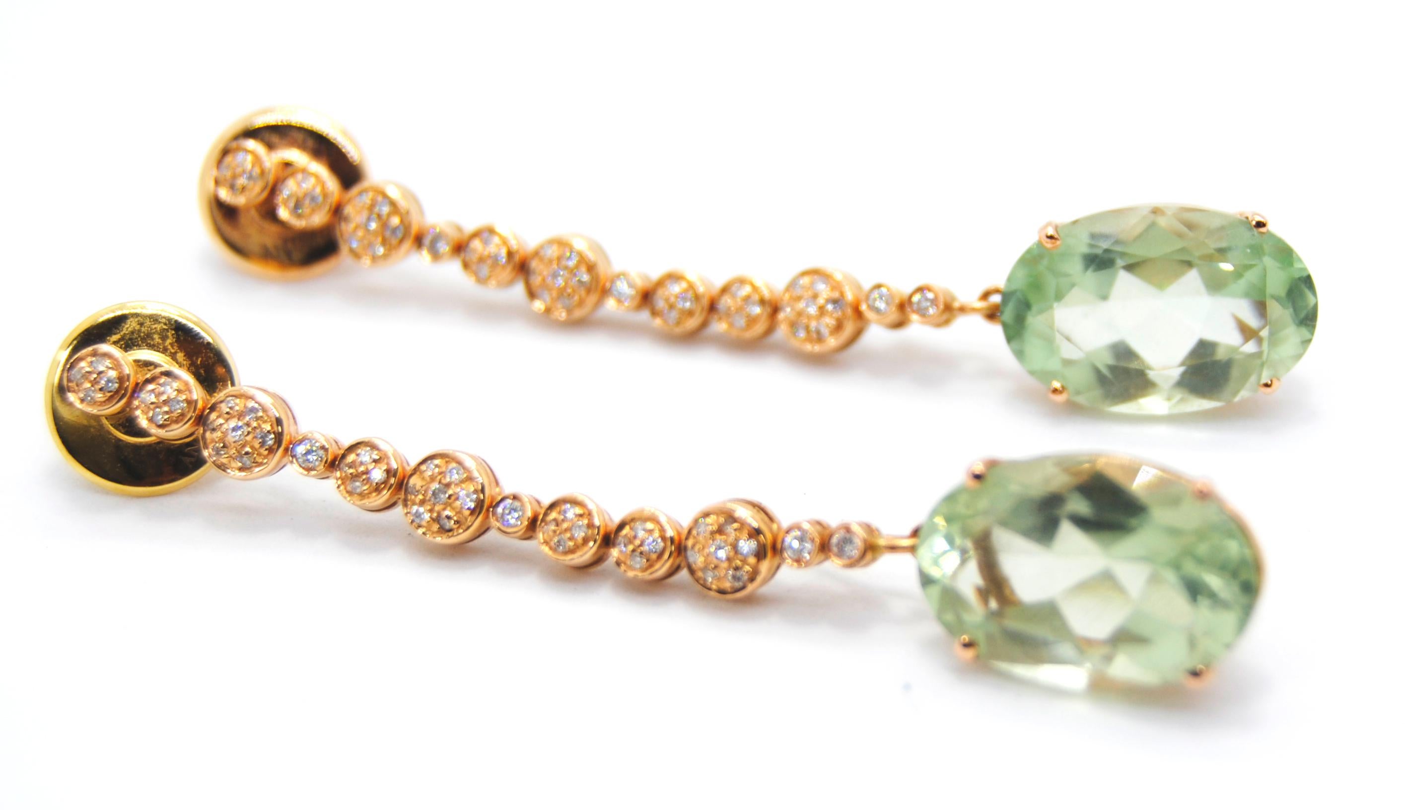Antonini 18kt Pink Gold earrings form with a Bright Green oval Amethyst 6ct each detachable drop from a cascade of long Pavé of Diamonds which total 1ct each 

The history ANTONINI is also the history of Milan, an Italian city with a great jewelry