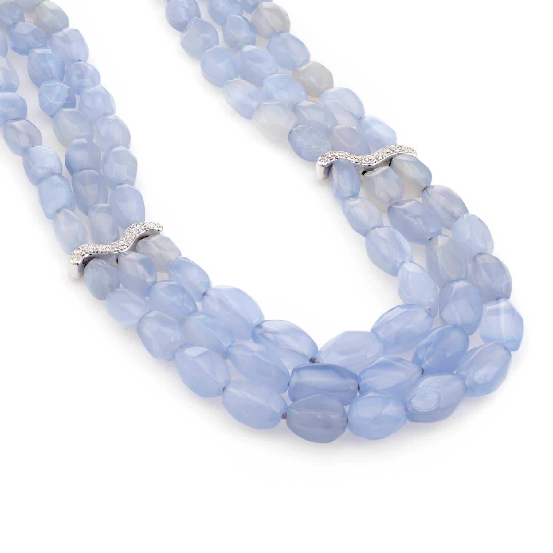 Elegant Antonini 3 strand blue chalcedony & diamond necklace, finished with an 18 karat white gold clasp and separators.  

Polished blue chalcedony measures (average) 13mm x 8mm. The diamonds total an estimated 0.60 carats (estimated at G-H color