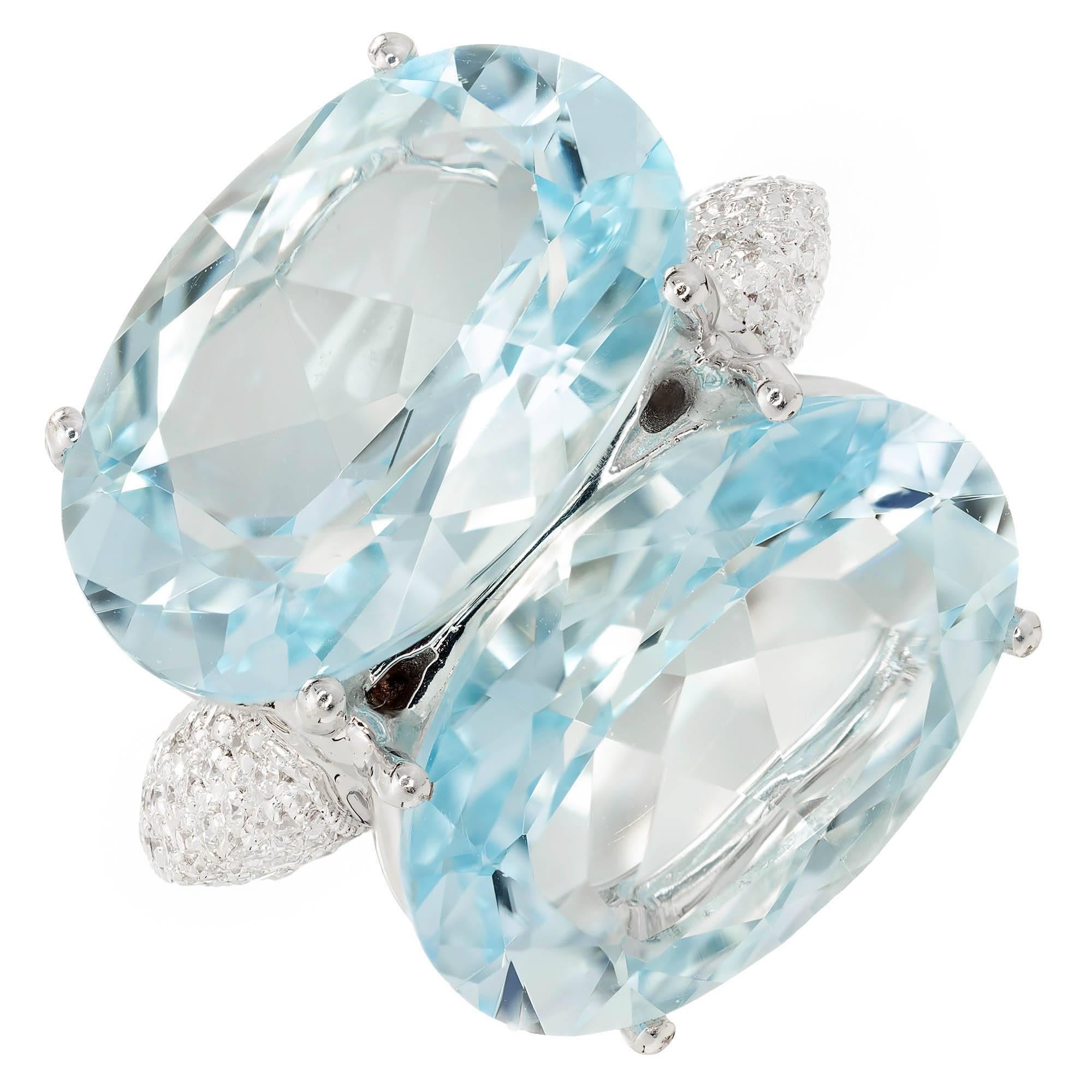 Antonini Panama collection double oval Aqua 22.00ct and diamond cocktail ring, set in 18 white gold.  

Two 18 x 12mm oval bright slightly greenish blue Aquamarine, approx. total weight 22.00cts, VS 
Approx. 75 full cut diamonds, approx. total