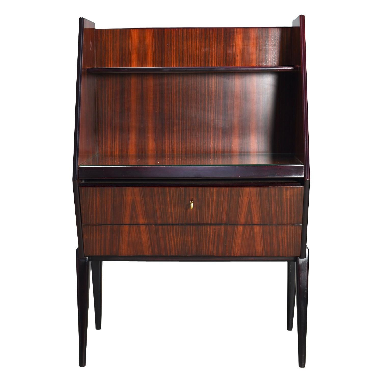 Italian midcentury writing desk / secretaire in Italian cherry. It has an extractable writing leaf.

Designer: Stabilimenti Napoli

Manufacturer: Antonino Gorgone

Country: Italy

Model: writing desk

Design period: 1950s-1960s

Date of