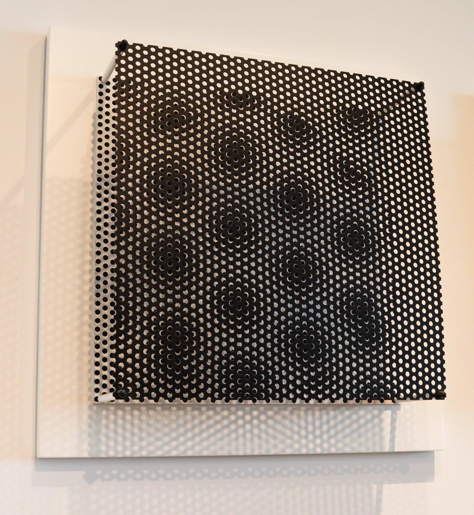 An op-art wall sculpture created by Antonio Asis.

This an amazing art piece created by the Argentinian op-art artist Antonio Asis. Made in a very limited edition of only fifteen pieces. He was an abstract kinetic artist Antonio Asis lives and works