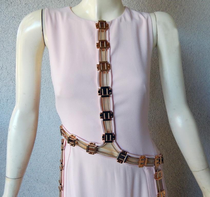 Antonio Berardi pale pink bias cut asymmetric gown with rose gold enhancement hardware.  Drawstrings are attached as pulleys to cinch parts of the dress as needed and to allow flashes of flesh to peek out. Dress also can be worn as shown on