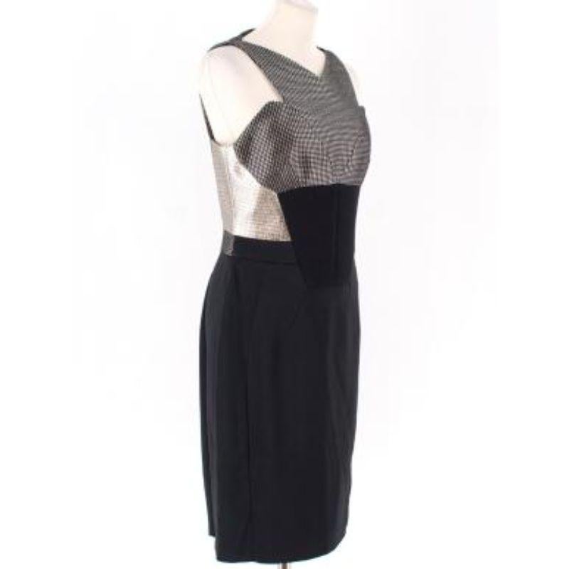 Antonio Berardi Silk and Wool Dress

- Metallic panelling to the top
- V-neckline
- Midi-length 
- Sleeveless

Please note, these items are pre-owned and may show some signs of storage, even when unworn and unused. This is reflected within the