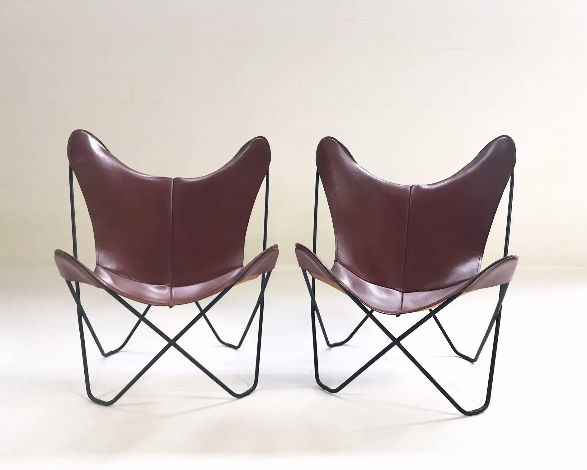The classic Butterfly chair! We wanted to keep this vintage pair as is since the leather still looks so good! There are some minor scratches to the leather consistent with age and use but overall this pair is in fine vintage condition. There is