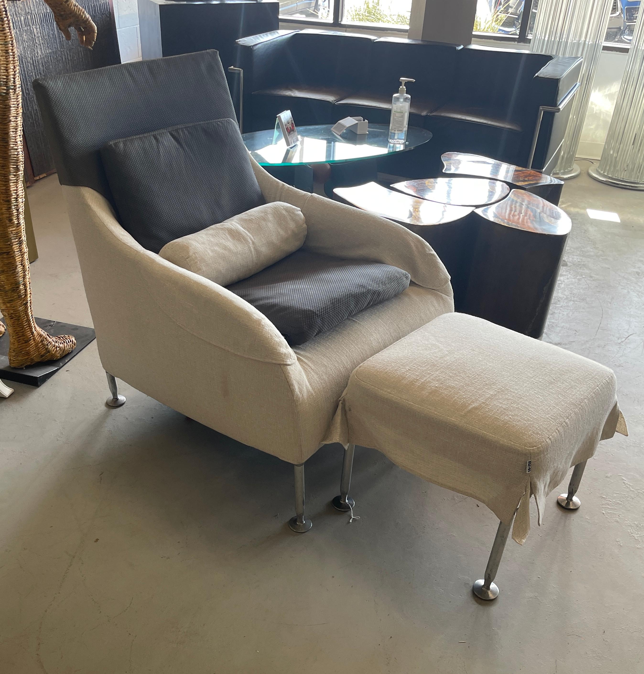 B & B Italia Florence chair and ottoman designed by Antonio Citterio. The chair has 2 pillows on it and 2 extra pillows. The ottoman has an extra cover as well. There is some extra brown/grey fabric. Lots of original tags and warranty cards. The