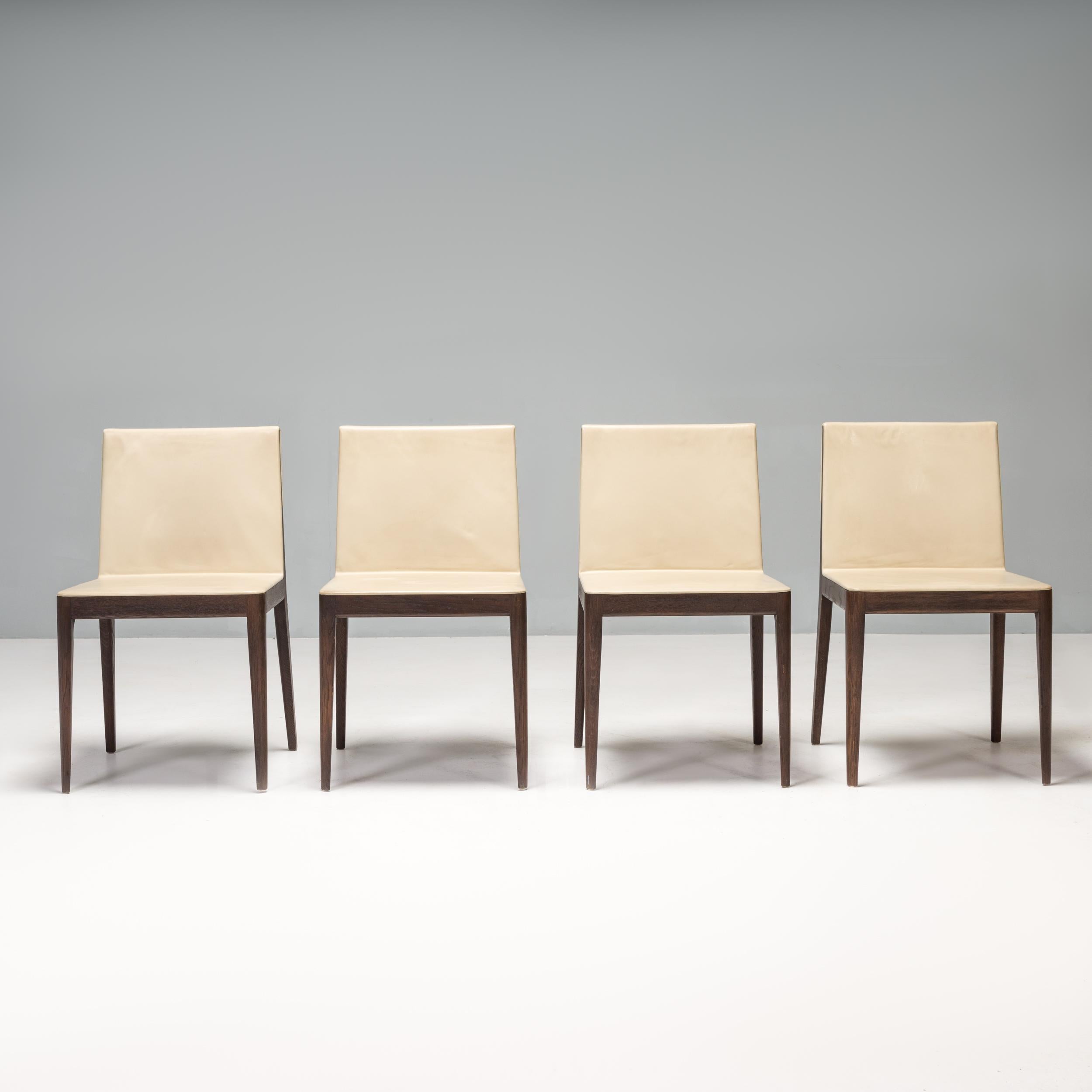 Originally designed by Antonio Citterio in 2009 for B&B Italia, the EL dining chair is a sleek and sophisticated piece of design.

Featuring a pared-back silhouette, the chairs have a solid smoked stained oak frame with a cross bar detail across