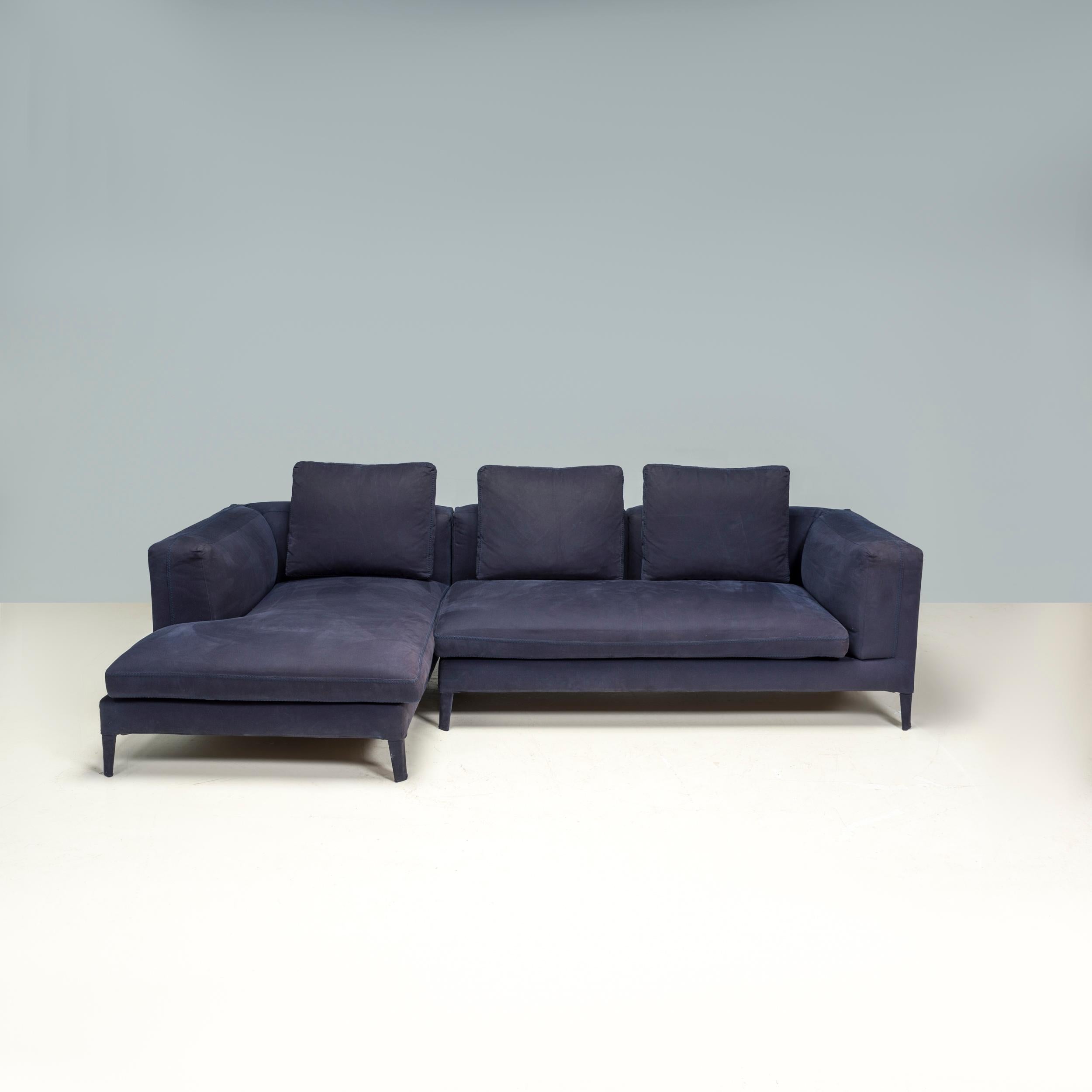 Originally designed by Antonio Citterio in 2012 for B&B Italia, the Michel sofa is a fantastic example of modern furniture design.

Constructed from a tubular steel frame, the sofa is made up to two modules in a classic tuxedo style with integrated