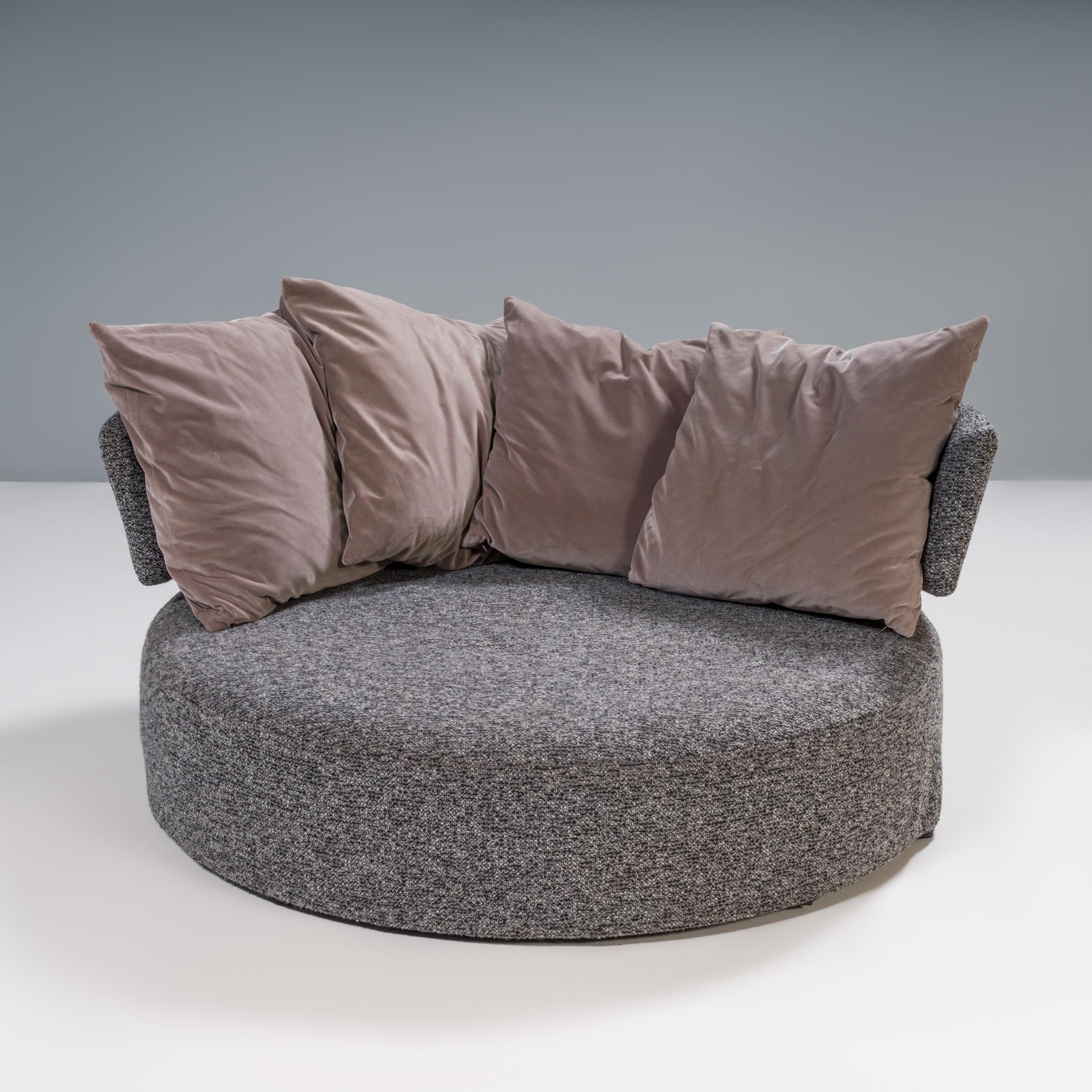 Designed by Antonio Citterio for B&B Italia, the Amoenus collection is a fantastic example of modern design.

The round loveseat is the ideal shape for lounging, with the deep seat offering the ultimate comfort.

Fully upholstered in grey fabric,