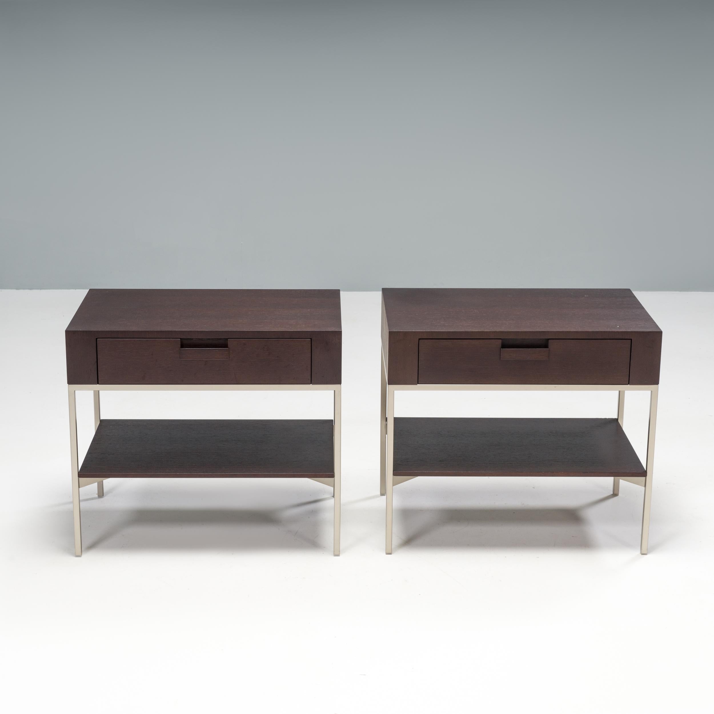 Originally designed by Antonio Citterio for Maxalto in 1996, the Ebe low table is a sleek, classic example of Italian design.

Constructed from grey oak, the tables sit on a slimline bright chrome frame and feature a single drawer unit with an