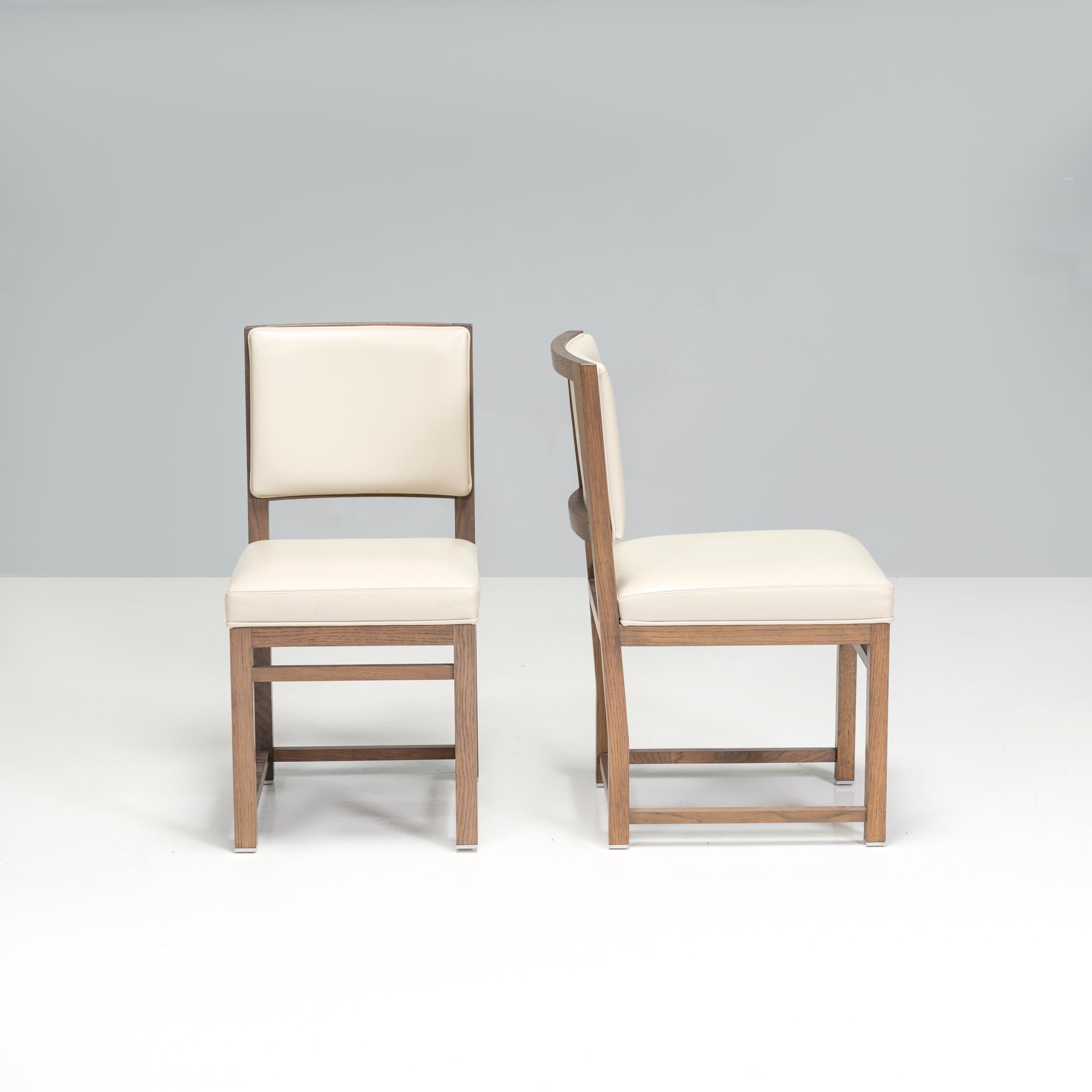 Originally designed by Antonio Citterio in 2008 for his Maxalto Simplice Collection, the Musa dining chair is a fantastic example of contemporary Italian design.

Constructed from a grey oak frame, the angular chairs have sled style legs and a