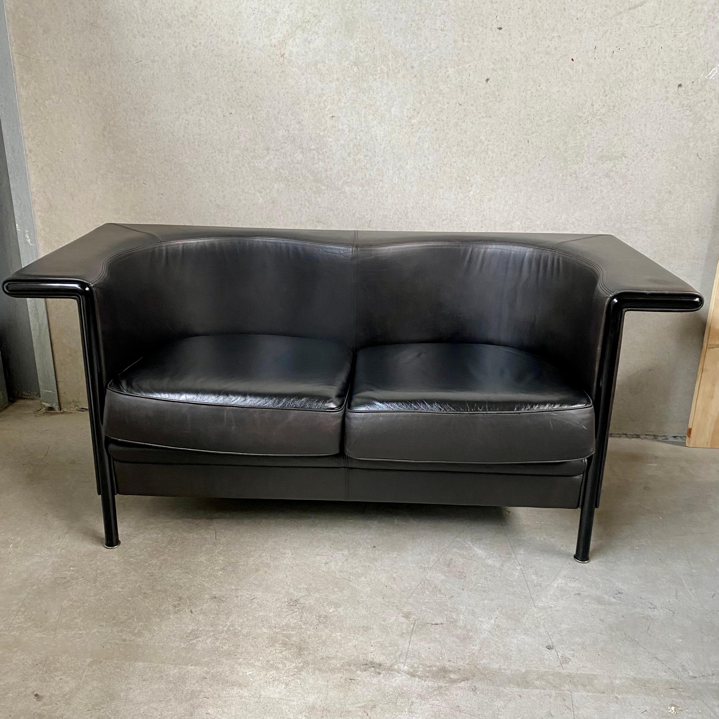 Introducing the vintage Antonio Citterio for Moroso Model 'Cricket' Sofa in dark brown leather. This Italian masterpiece, crafted in 1980, showcases the remarkable talent of Antonio Citterio, a renowned designer celebrated for his exceptional