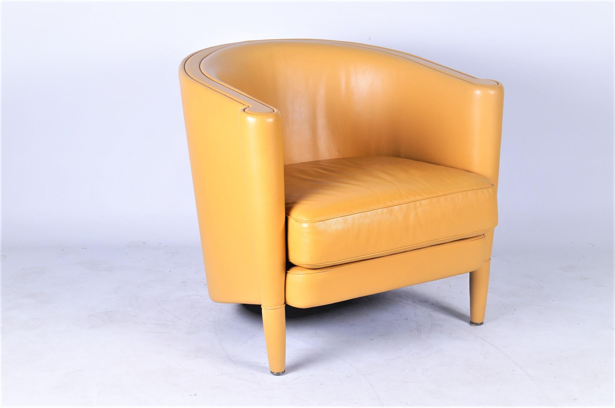 Antonio Citterio for Moroso - 'Rich' lounge chair
 
A very stylish collectible Moroso 'Rich' armchair in bright yellow leather with a single back leg giving it a beautiful shape. Designed by Antonio Citterio in the 1980s. In very good condition