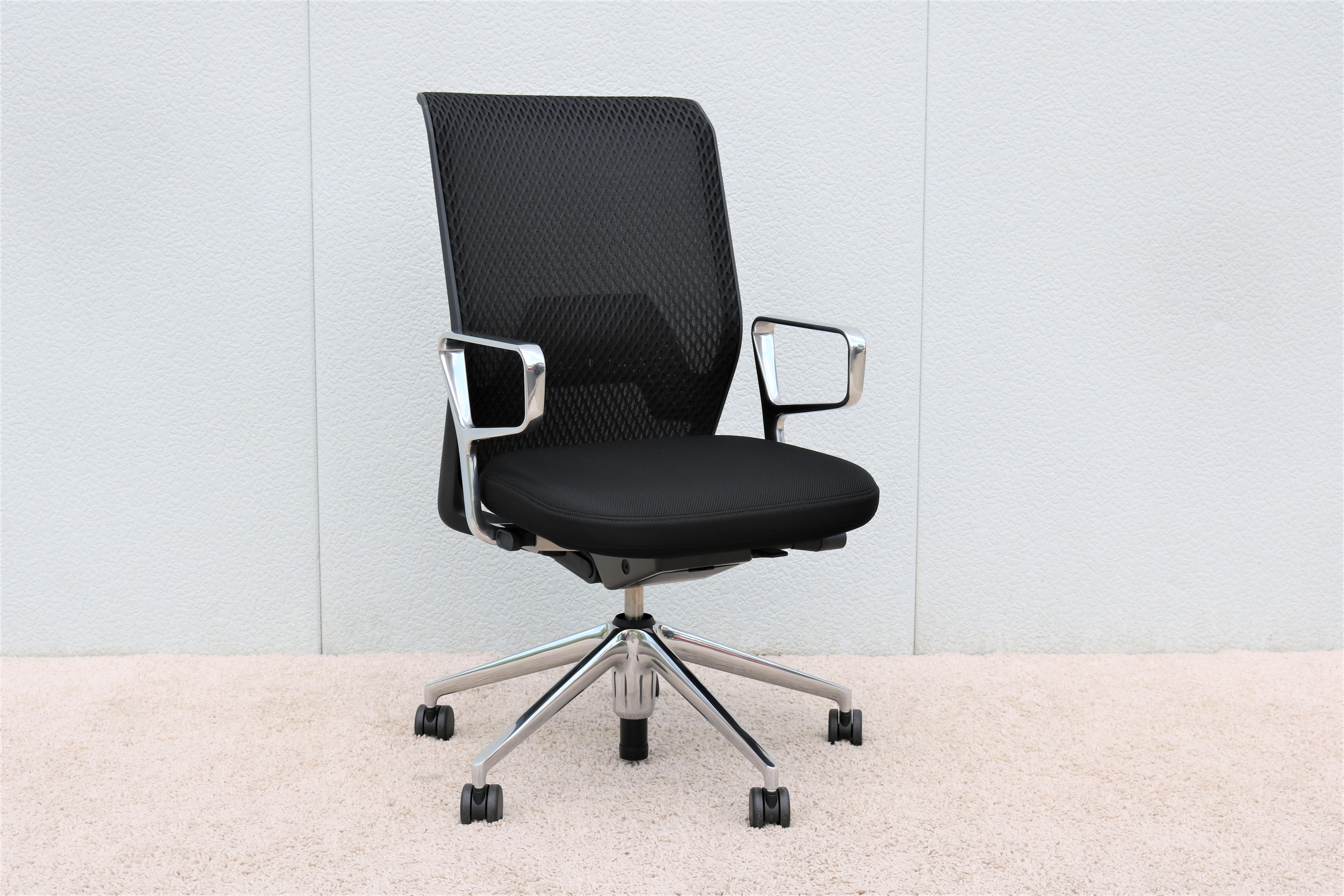 The ergonomic ID mesh office desk chair designed by Antonio Citterio for Vitra successfully combines comfort, technology, and elegance. 
Features a soft seat and supportive backrest mesh that allows air to circulate and offers sustained comfort.