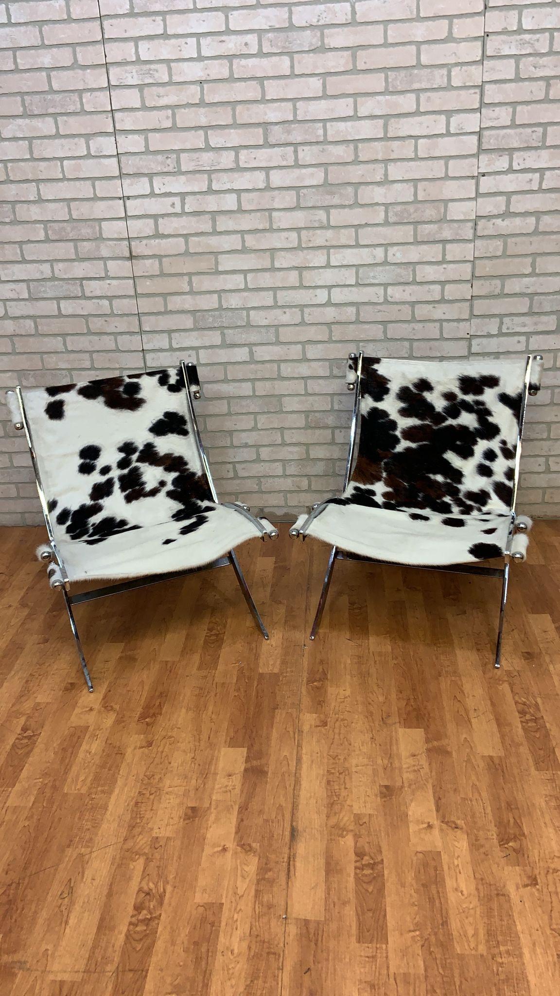 Mid Century Modern Antonio Citterio  ”Timeless” Lounge Scissor Chairs for Flexform Newly Upholstered in a Black and White Cowhide - Pair

This exceptional pair of “Timeless” classic mid century modern chairs by Antonio Citterio for Flexform are not